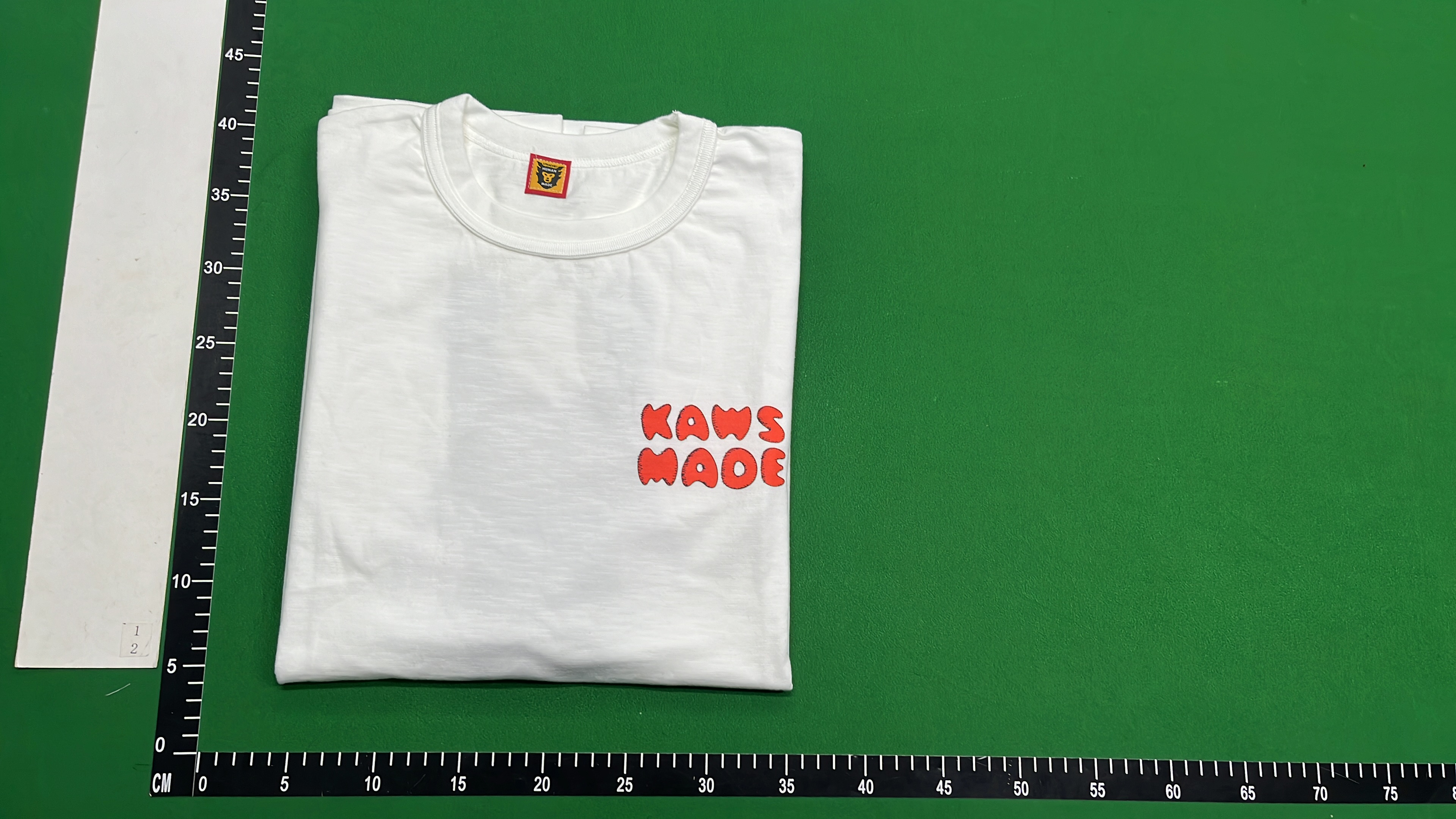 KAWS x BAPE T-Shirt with Companion Character Design