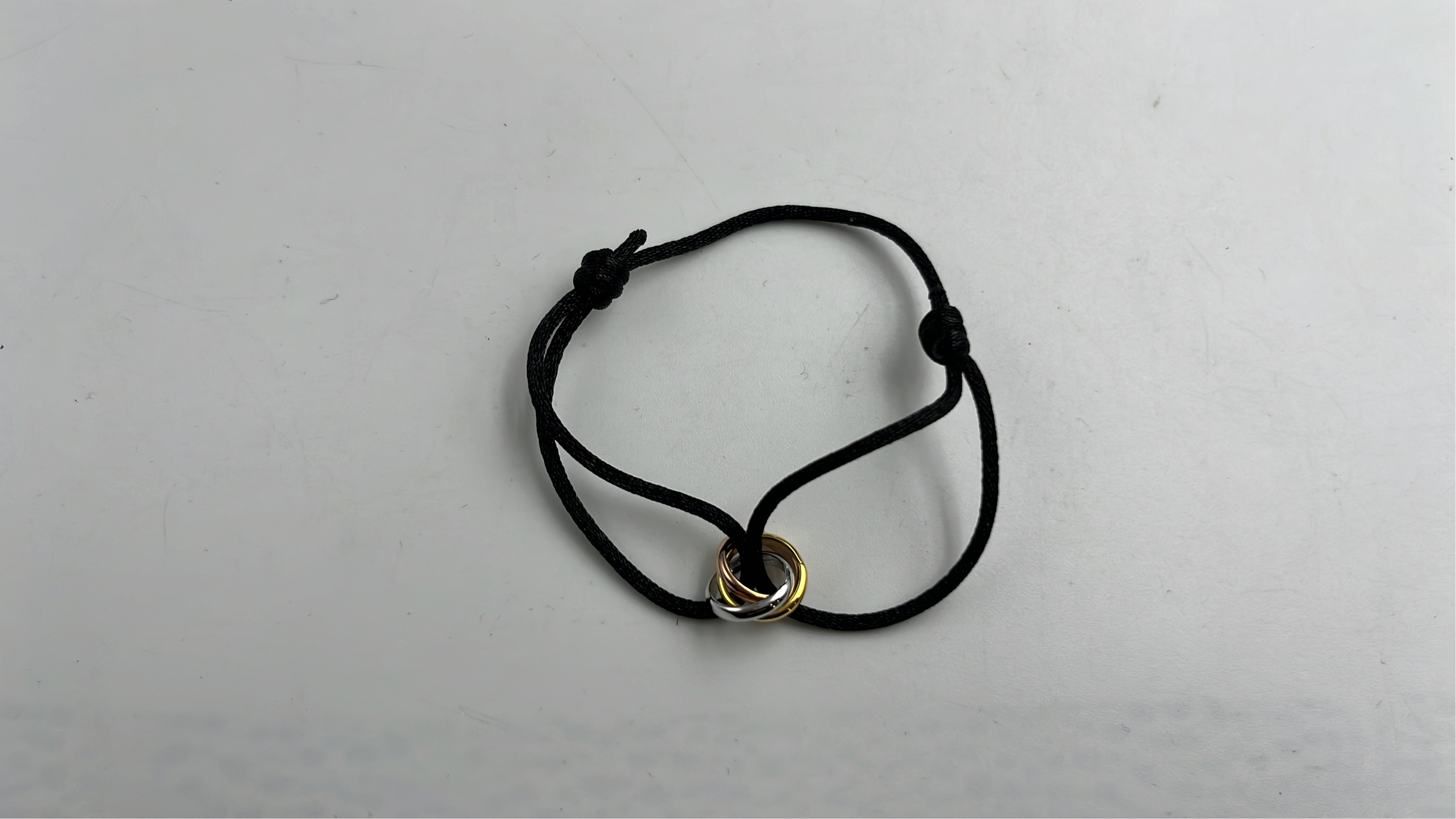 Trinity Ring with White Rope Bracelet
