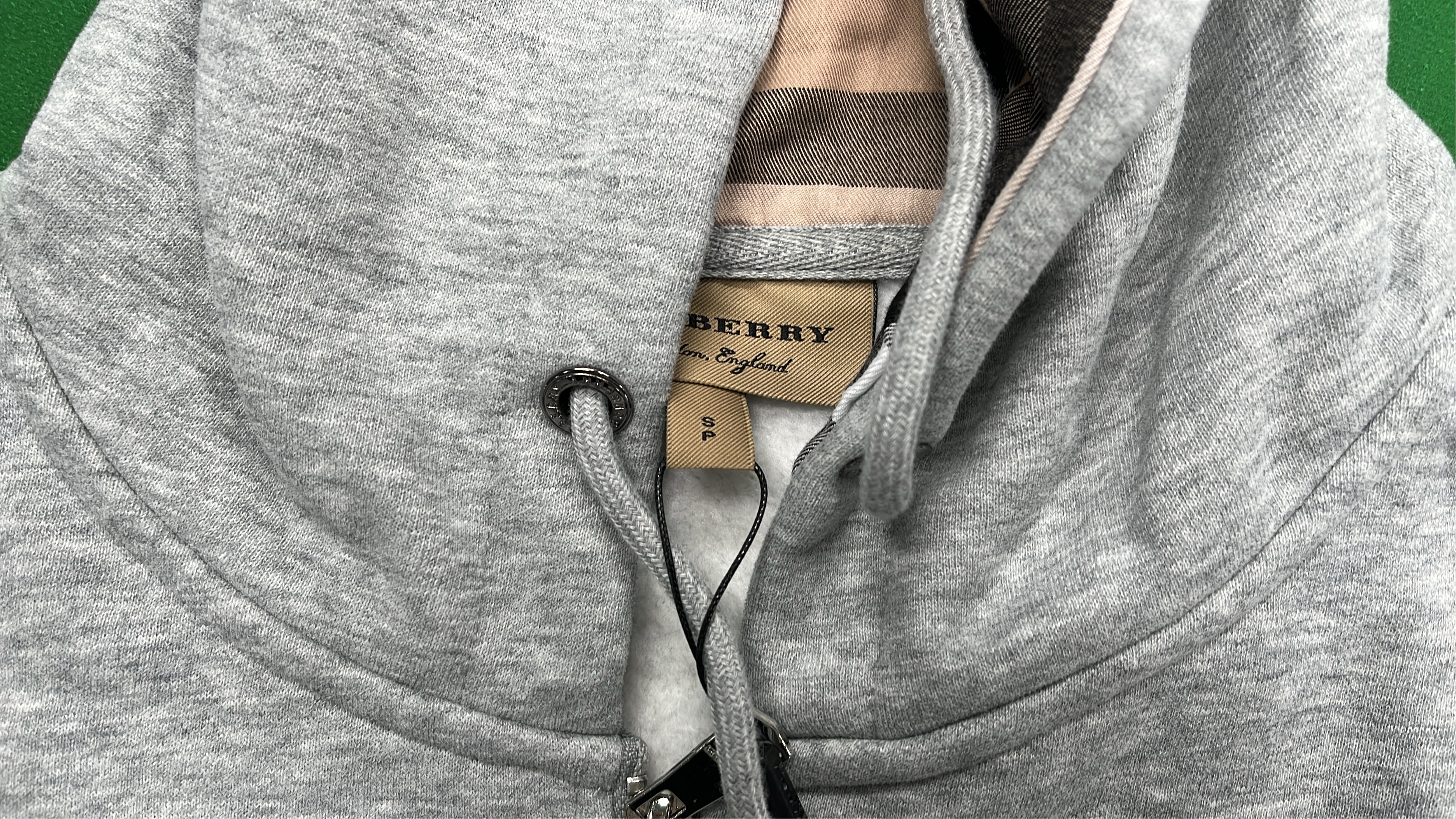 Light Gray Zip-Up Hoodie with Check Lining