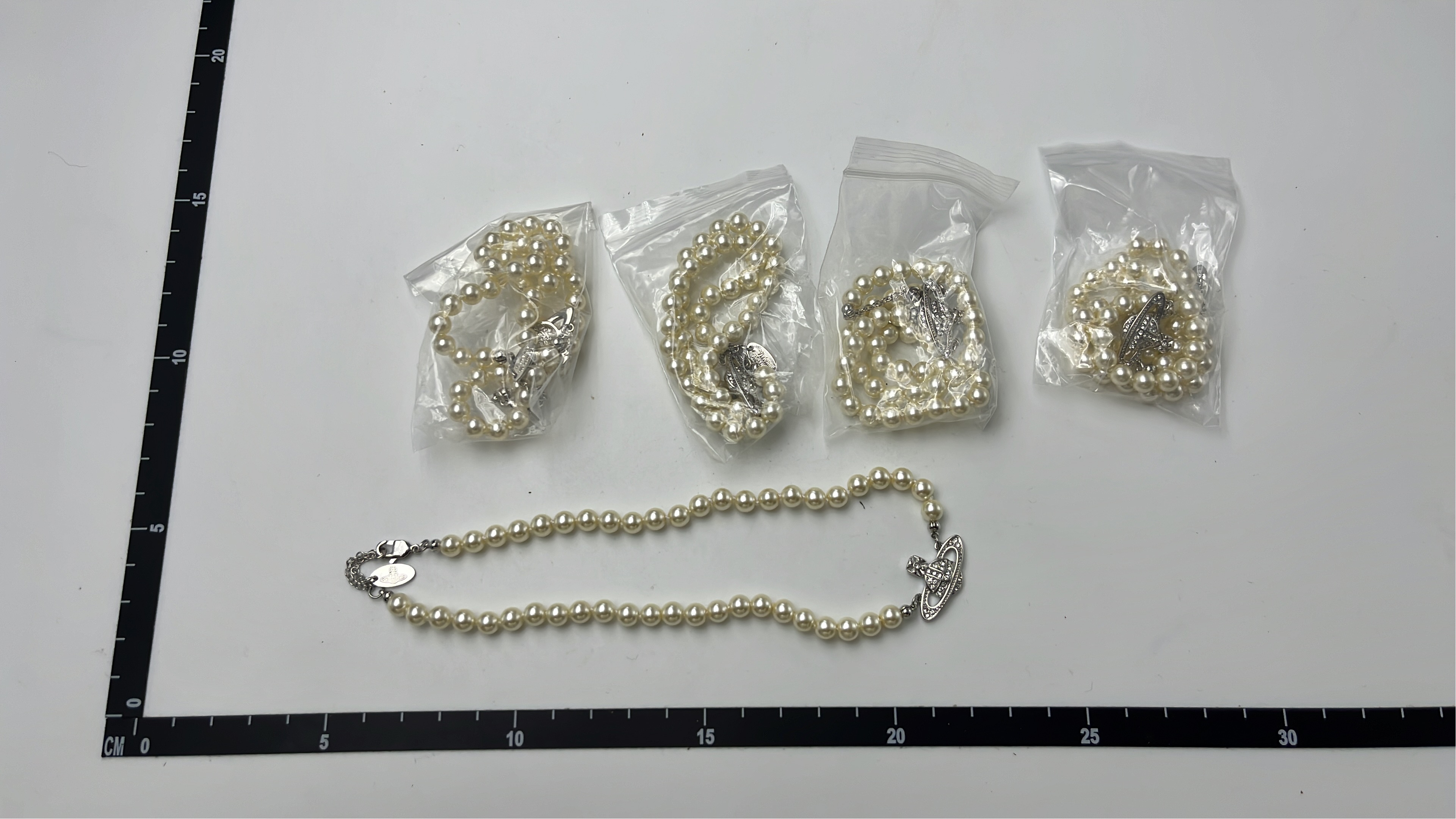 Vivienne Westwood Pearl Necklace with Orb Pendant