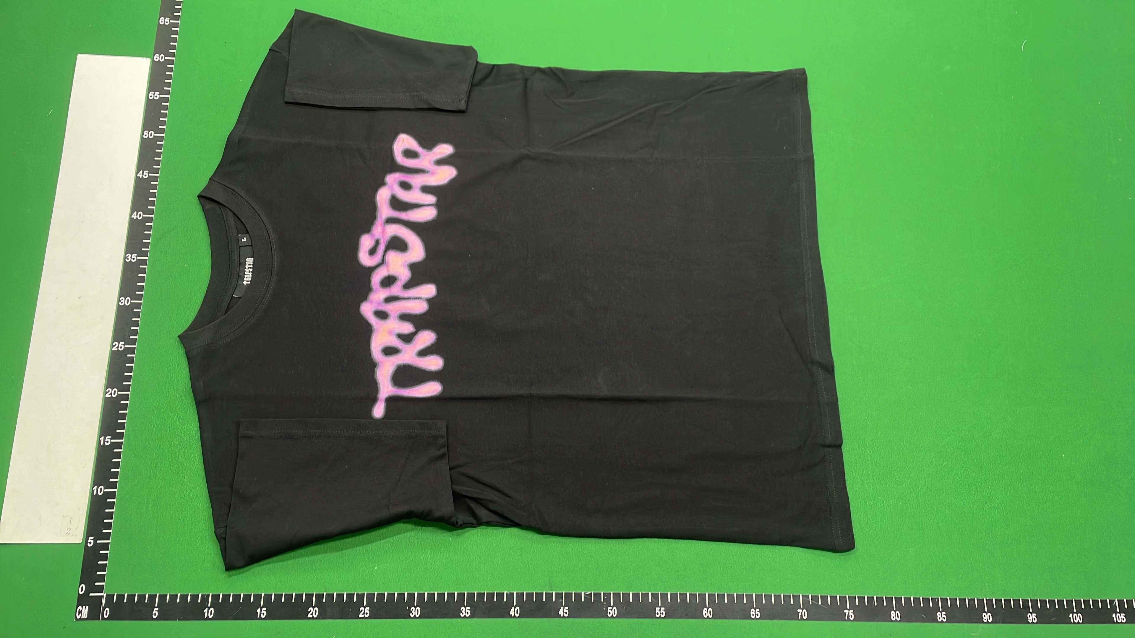 Trap Star Black T-Shirt with Purple Graphic Design