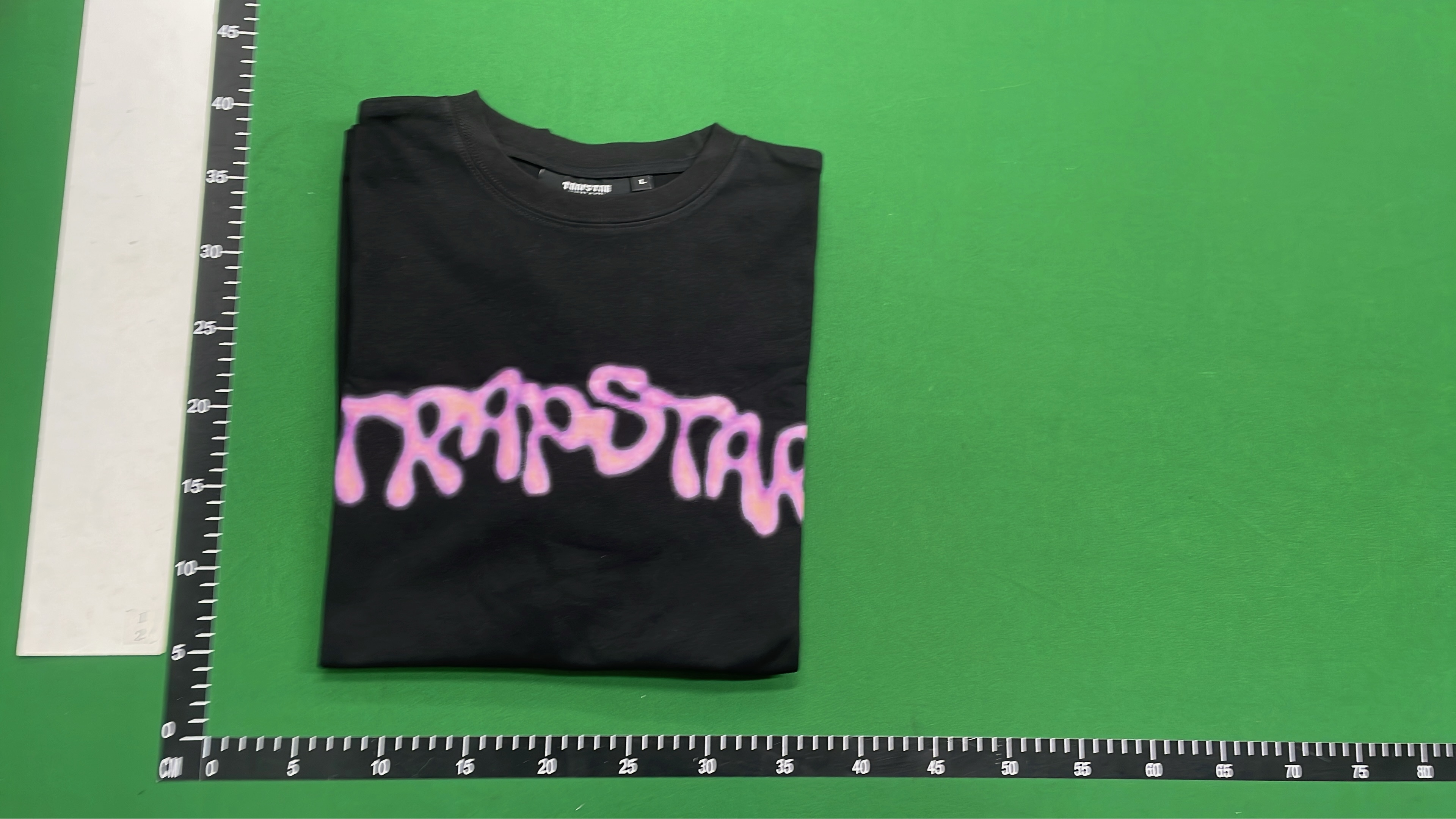 Trap Star Black T-Shirt with Purple Graphic Design