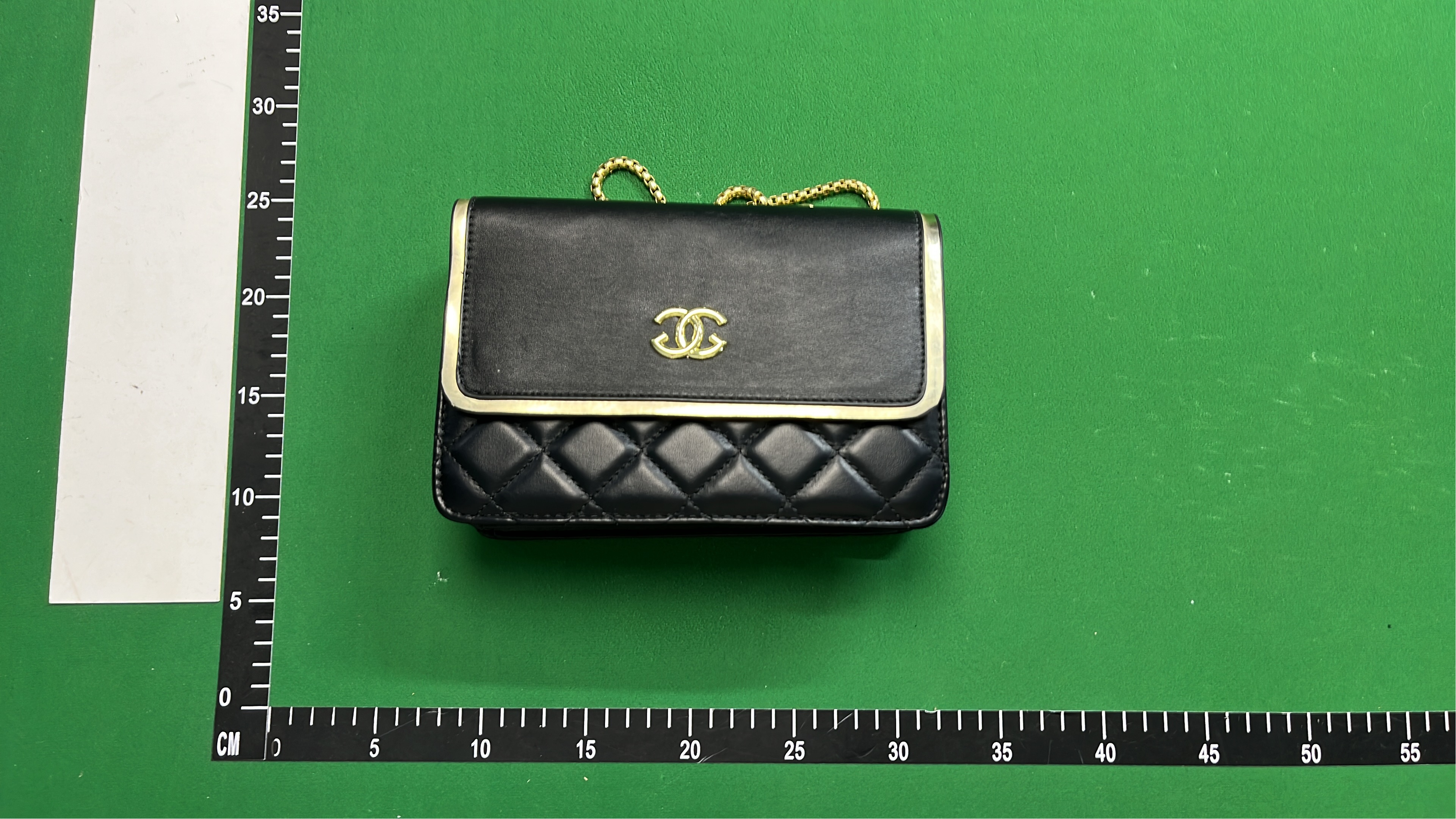 Chanel Black Quilted Flap Bag with Gold Chain Strap