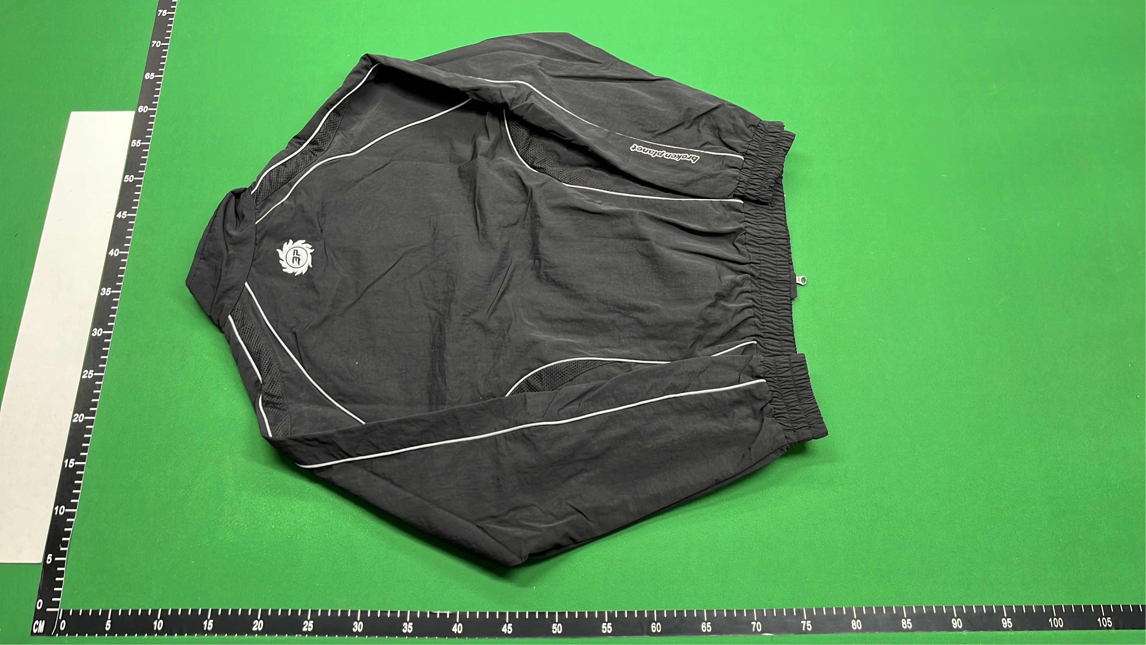 Black Track Jacket with White Stitching and Logo