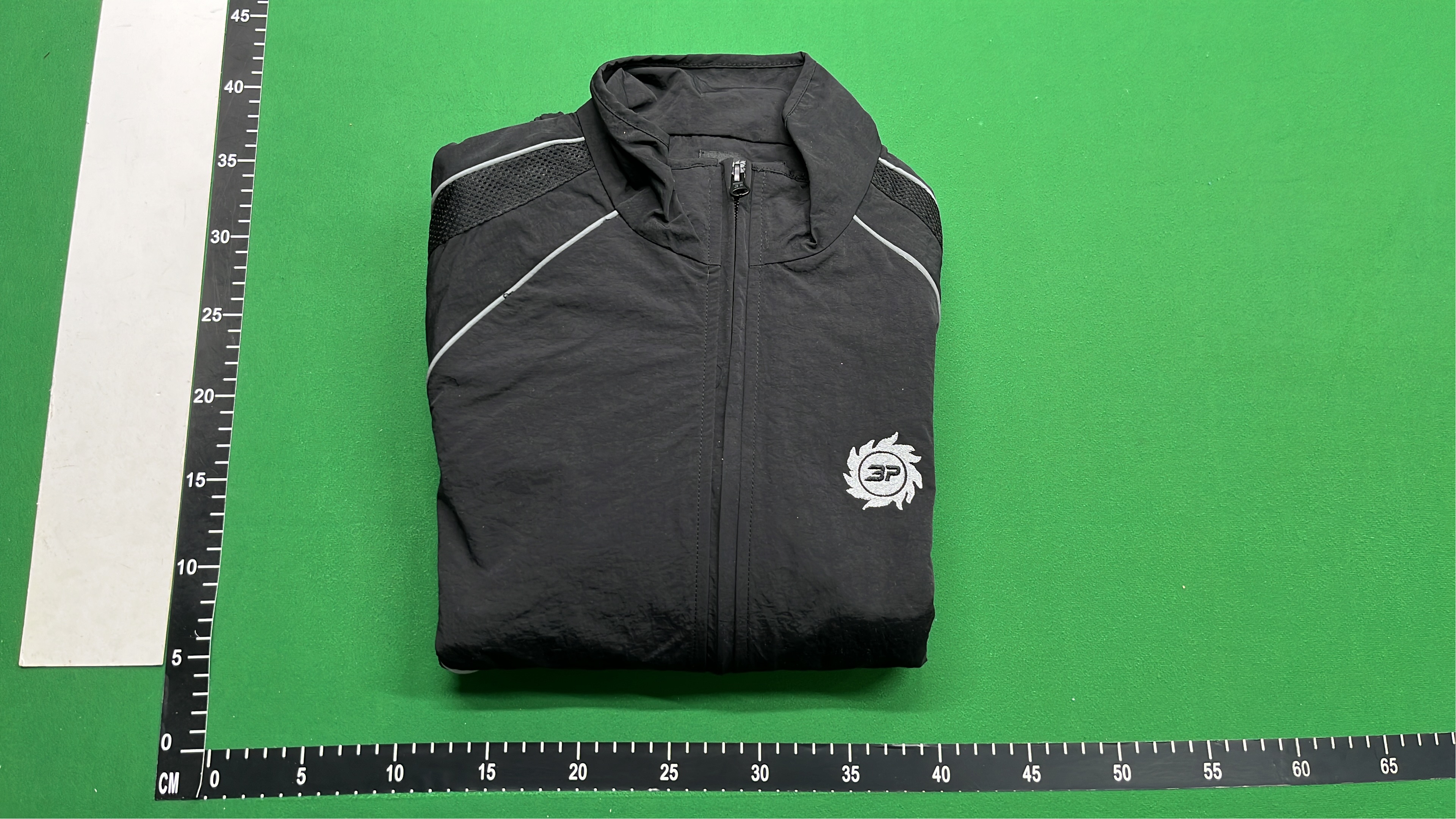 Black Track Jacket with White Stitching and Logo