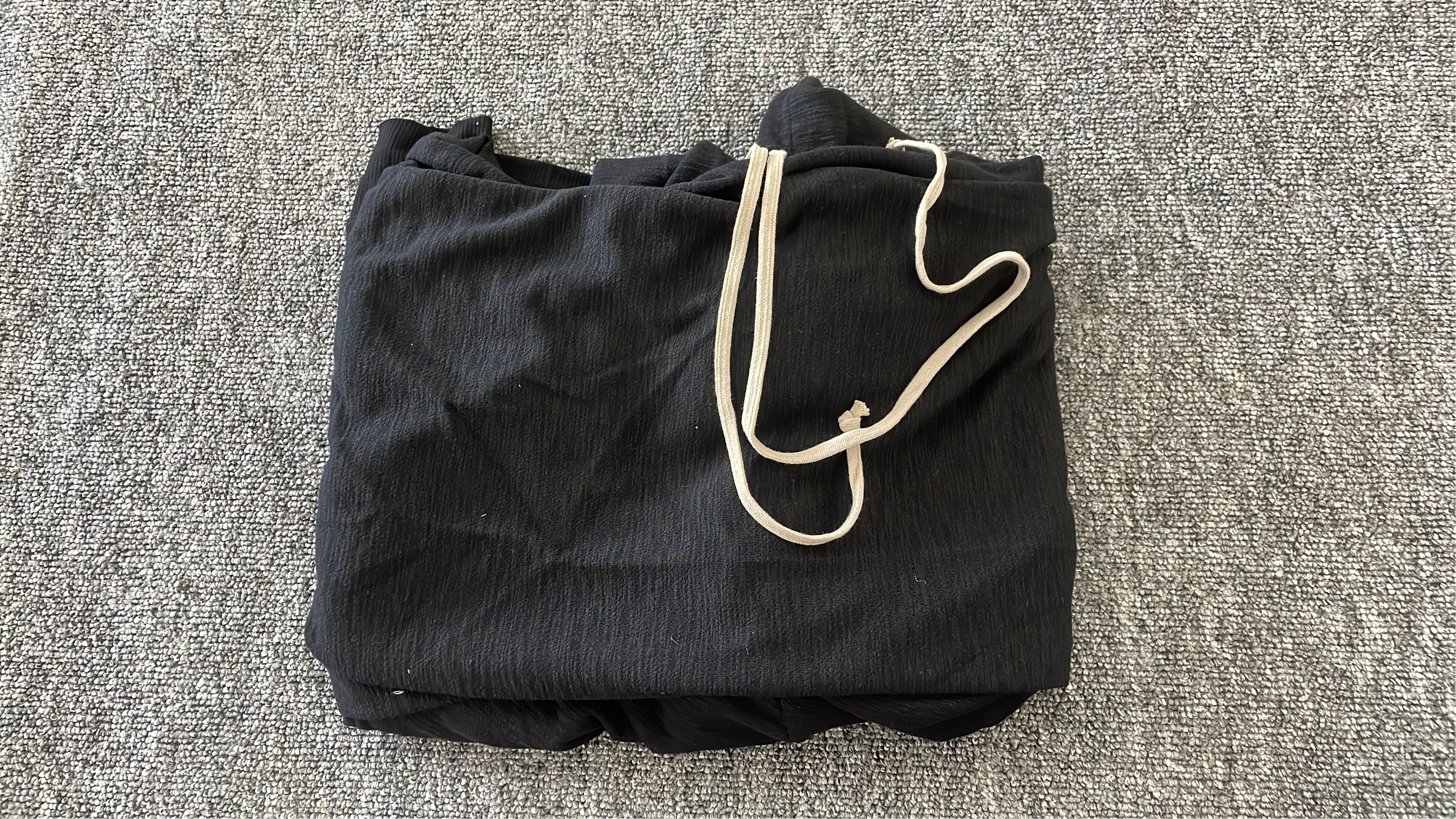 Black Asymmetrical Hoodie with White Drawstrings