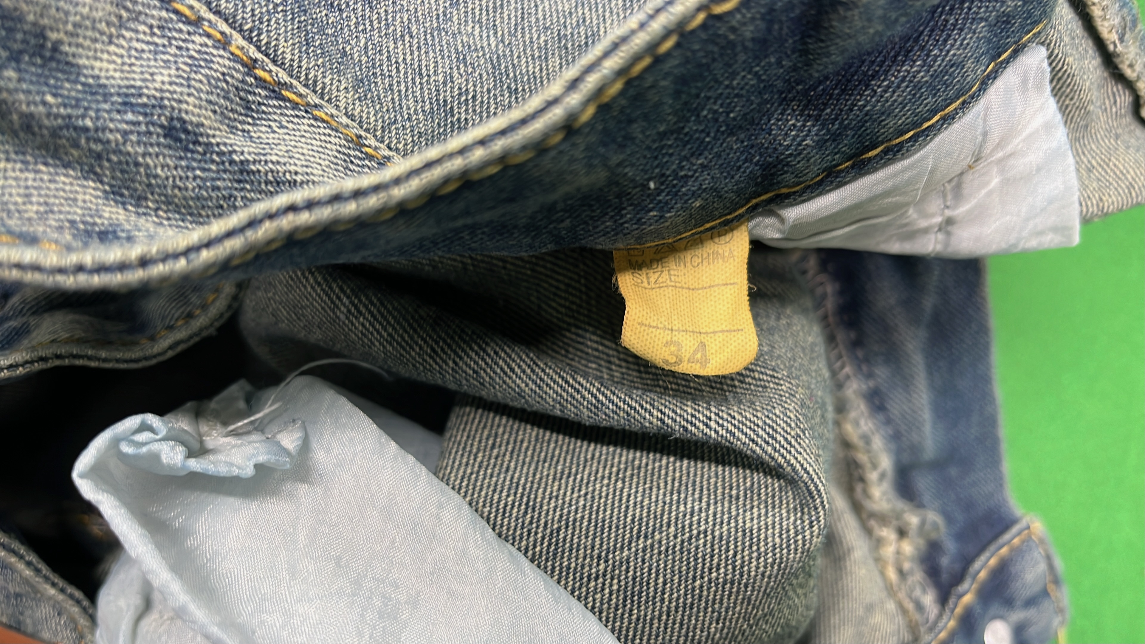 Vintage Washed Denim Jeans with Heart Patch Design