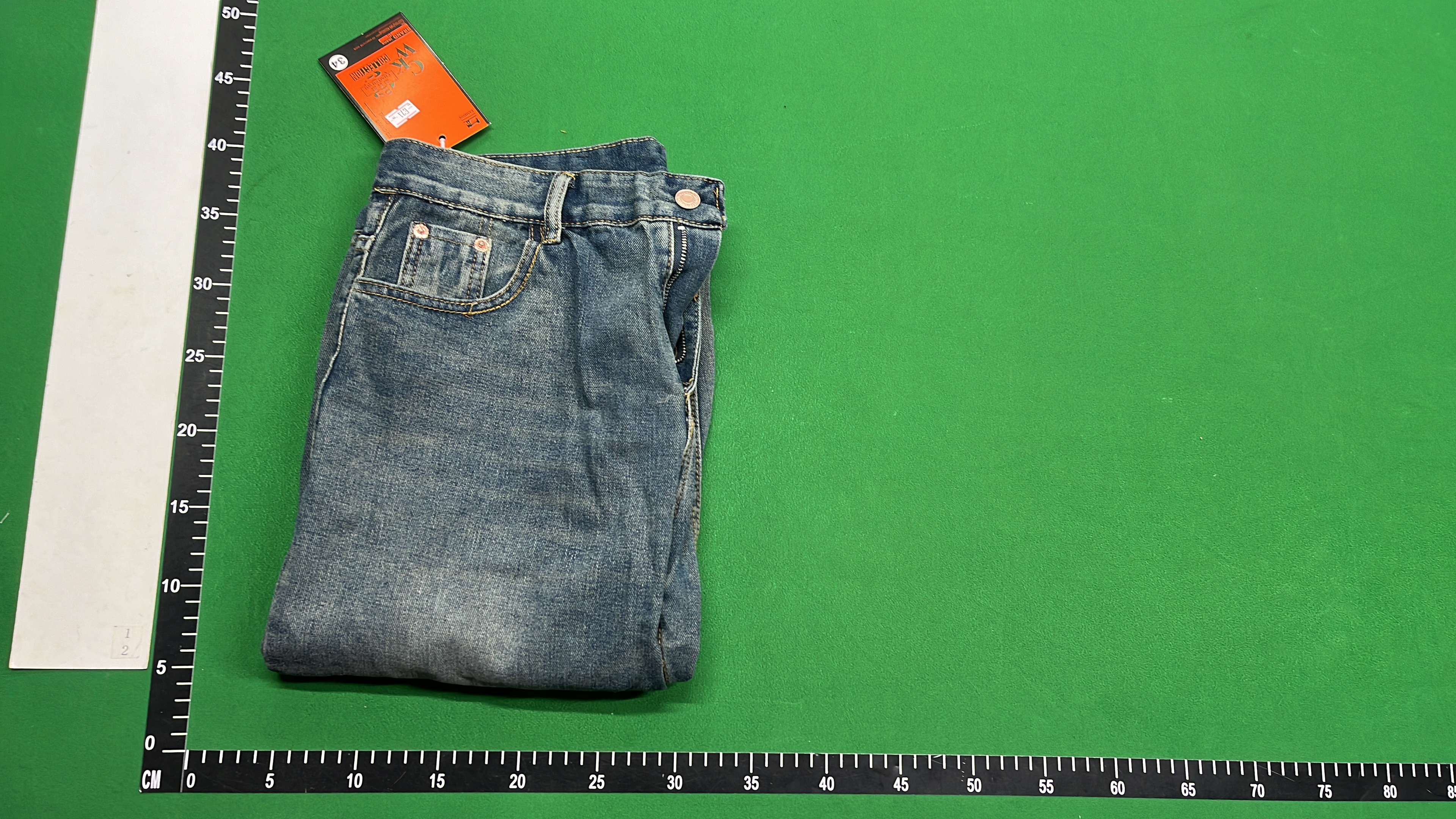 Vintage Washed Denim Jeans with Heart Patch Design
