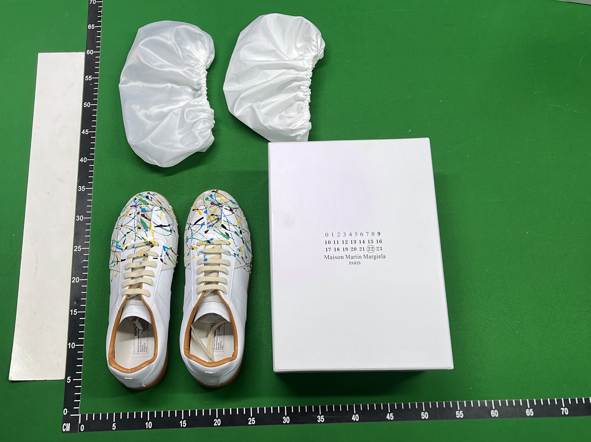 Adidas White Sneakers with Colorful Paint Splatter Design