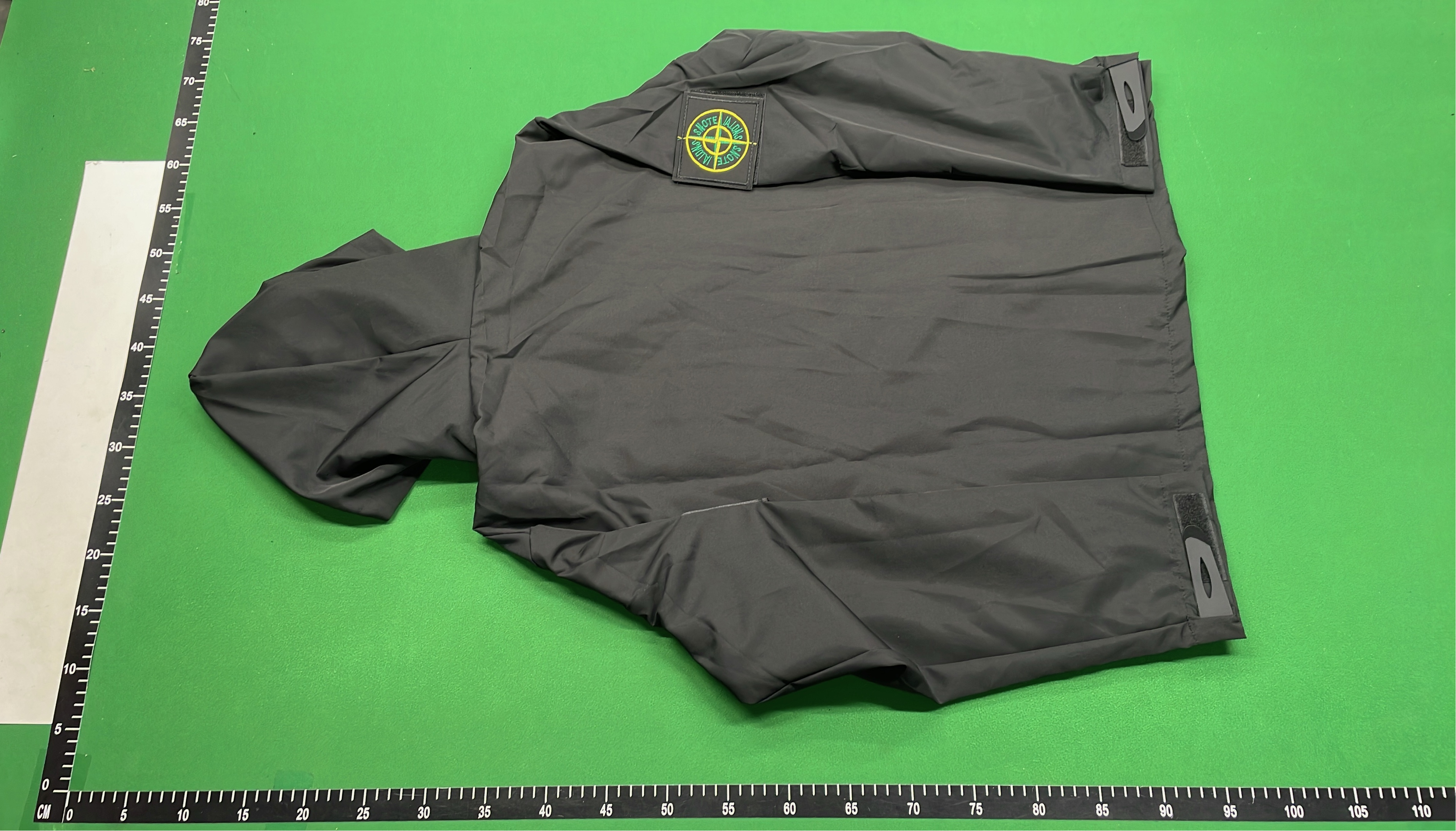 Black Hooded Jacket with Green Logo Patch