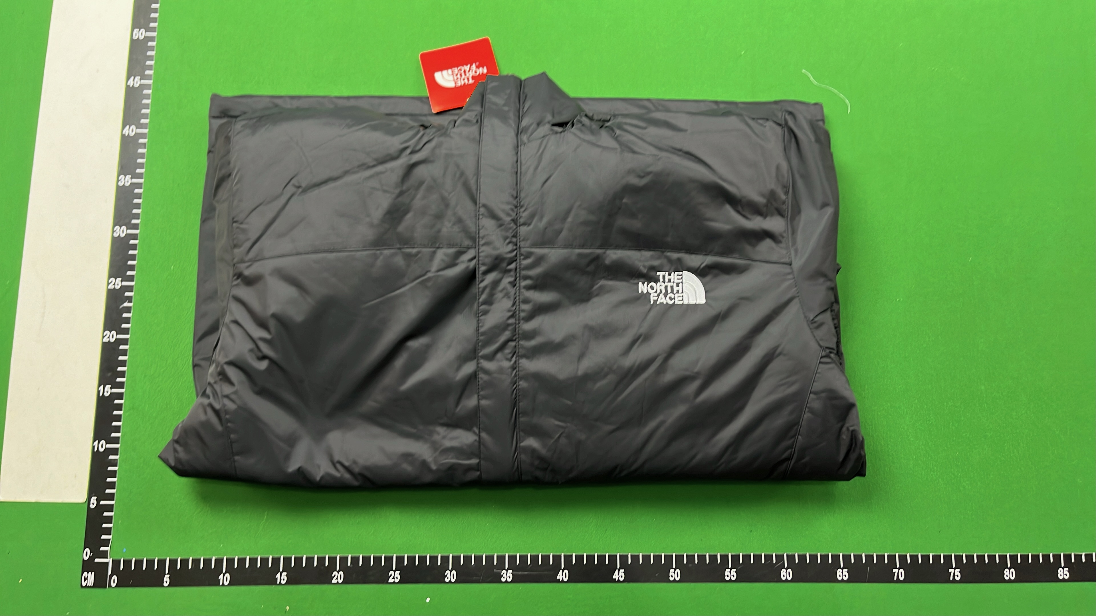 The North Face Black Hooded Jacket for Outdoor Adventures