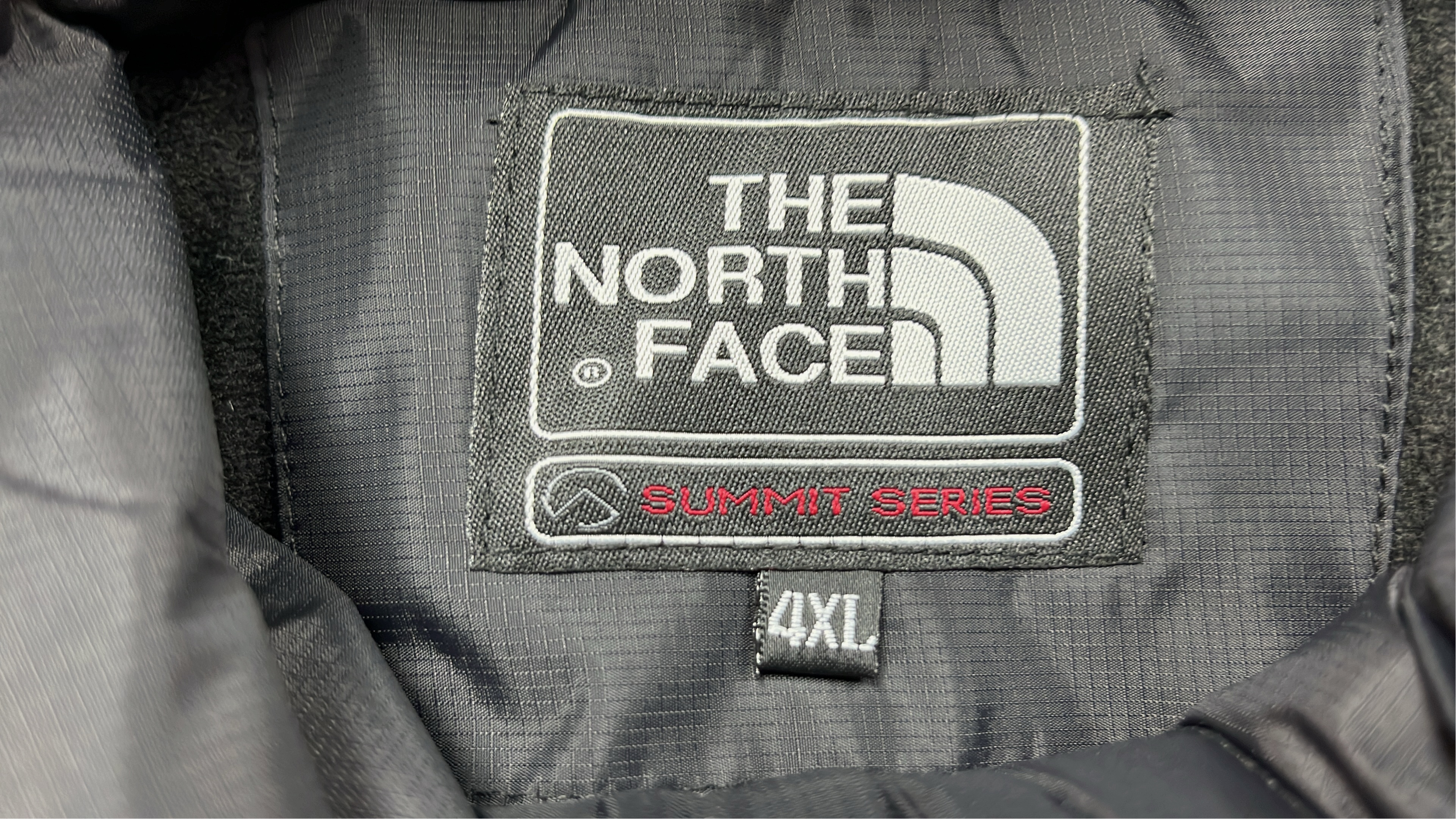 The North Face Black Hooded Jacket for Outdoor Adventures