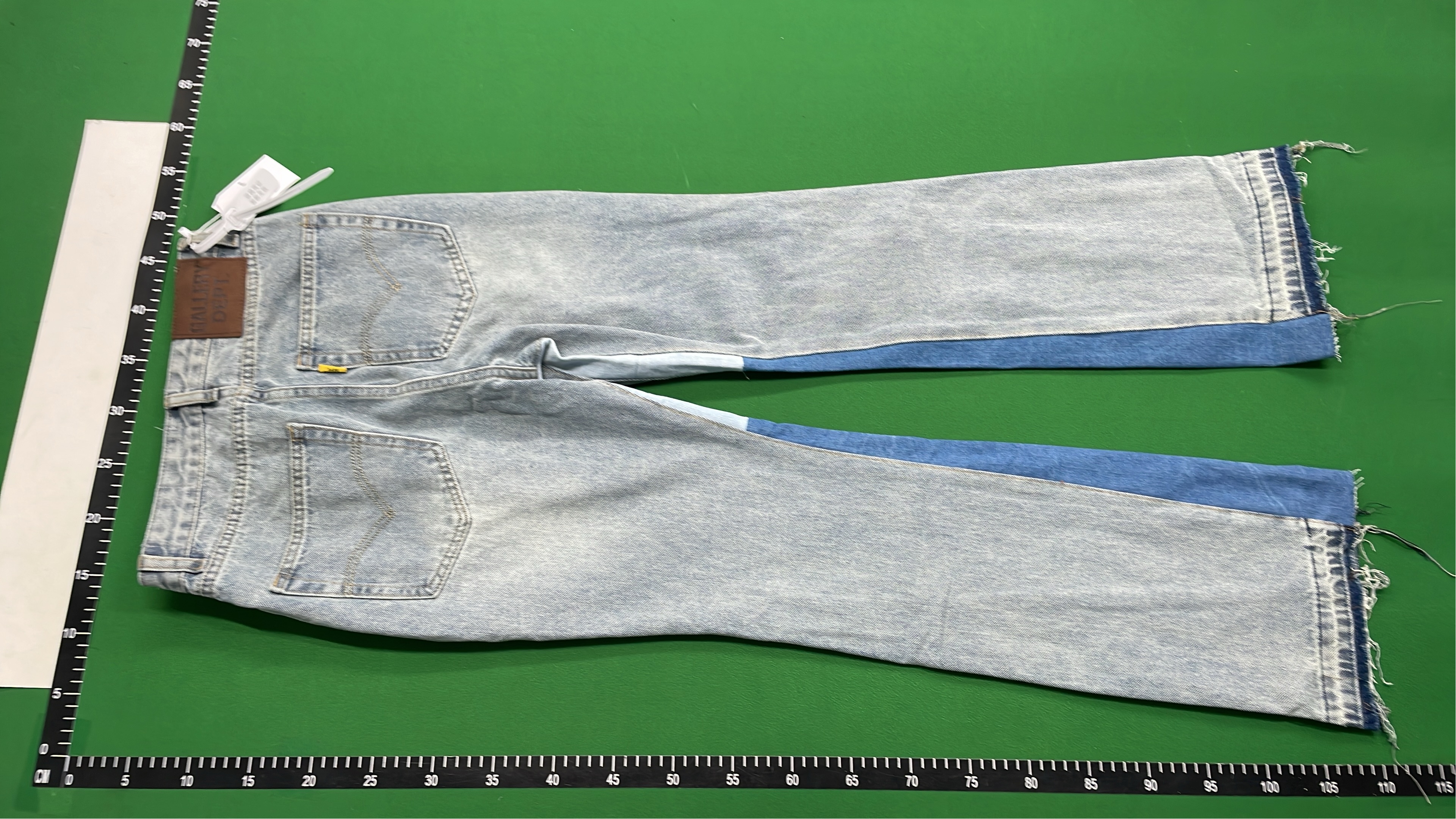 Vintage Patchwork Denim Jeans with Frayed Hem and Cream Accents