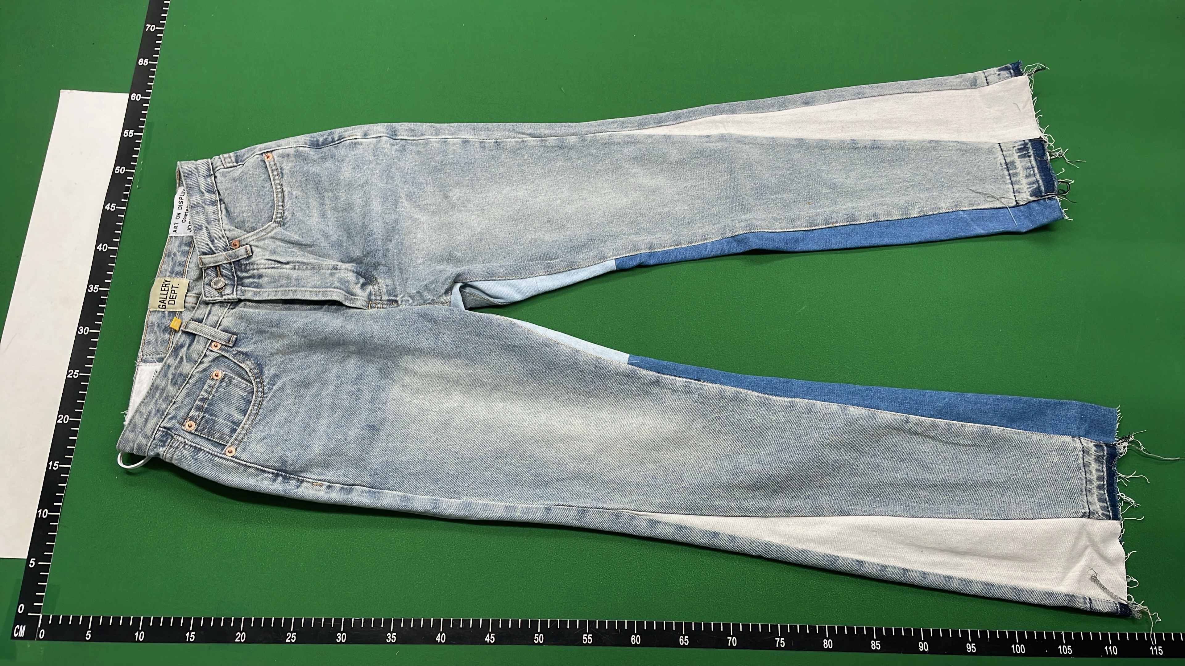 Vintage Patchwork Denim Jeans with Frayed Hem and Cream Accents
