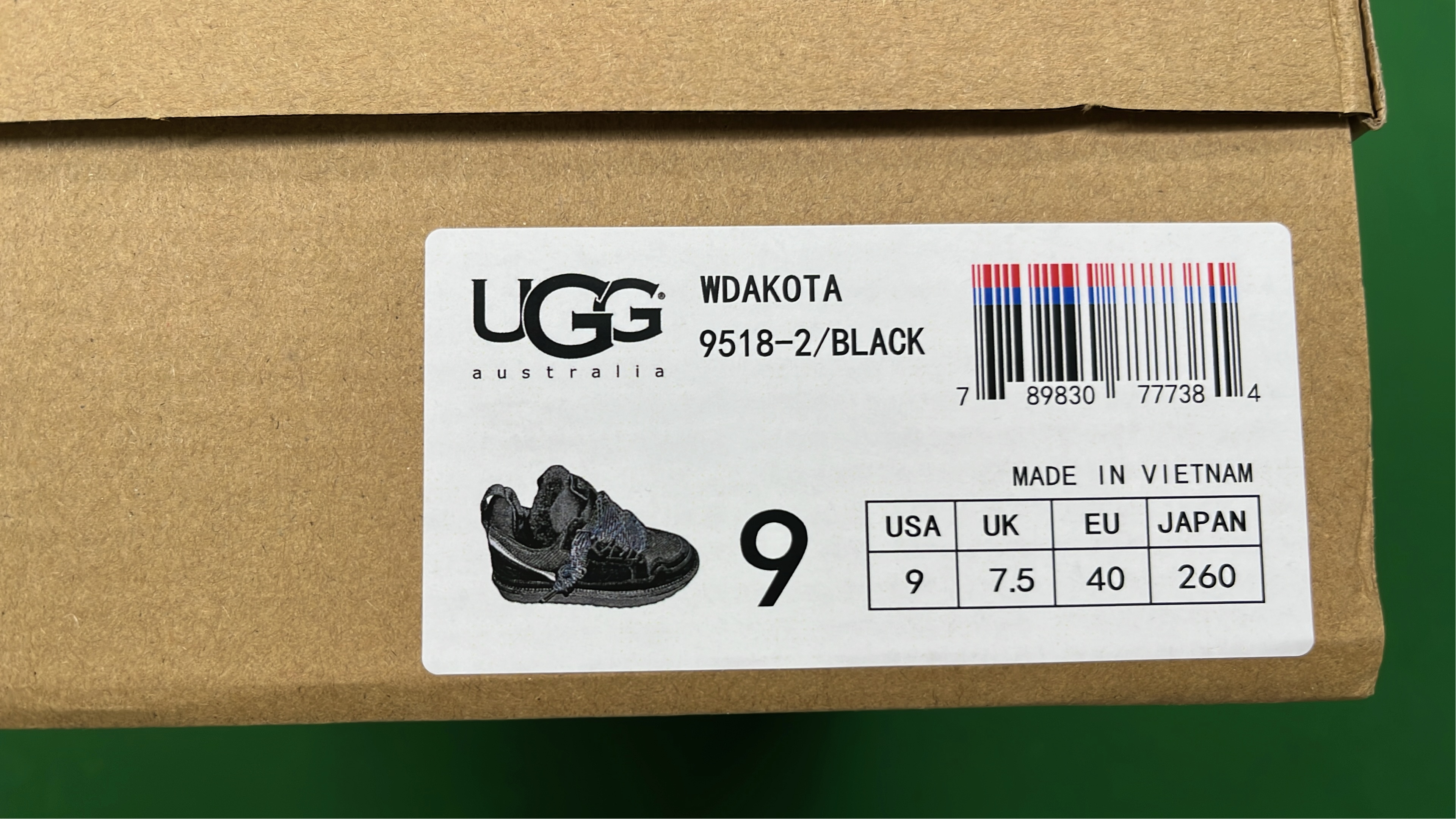 UGG Black Fuzzy Laced Sneakers with Chunky Sole