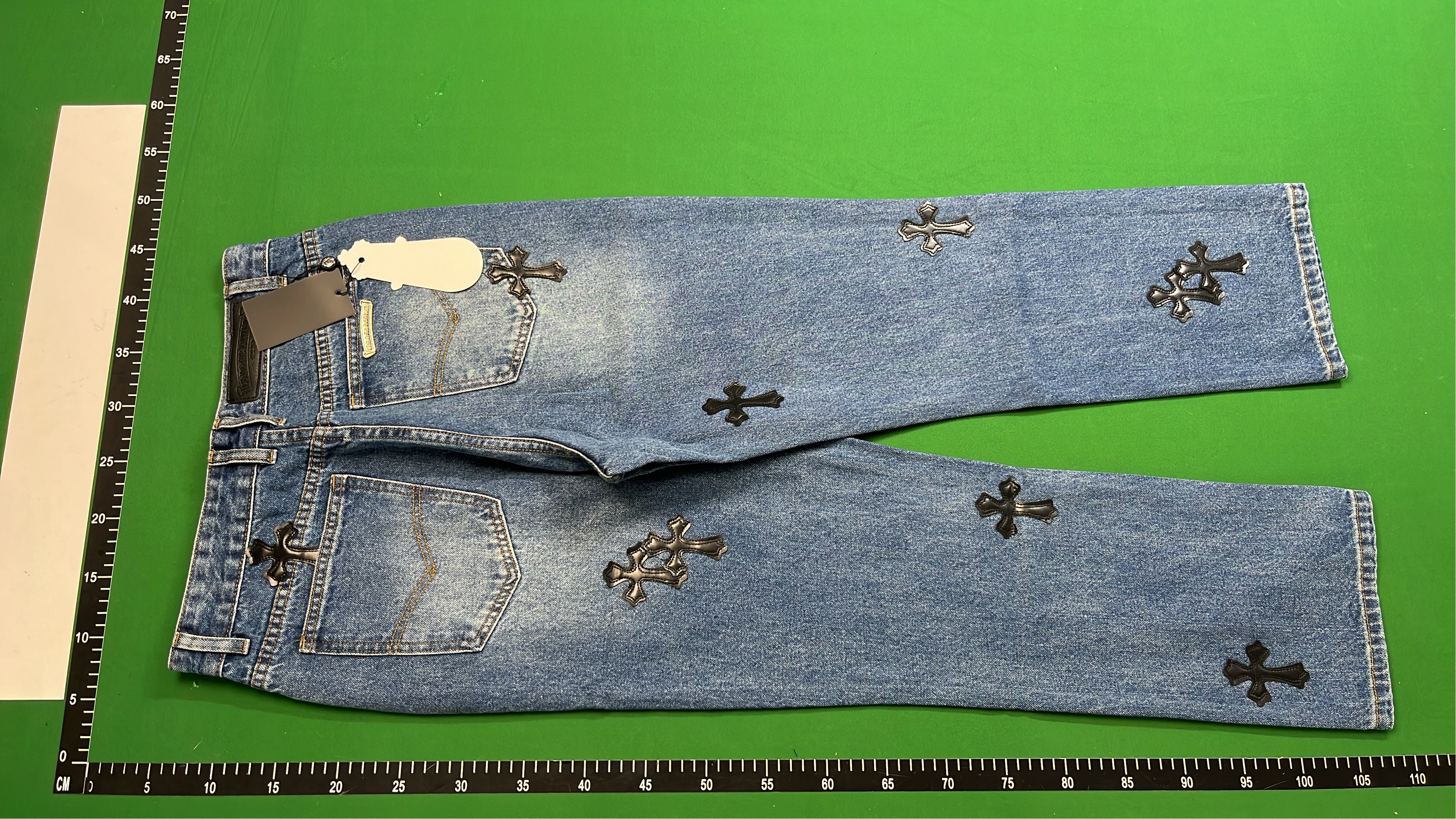 NoStylist Embroidered Denim Pants with Cross and Graphic Design