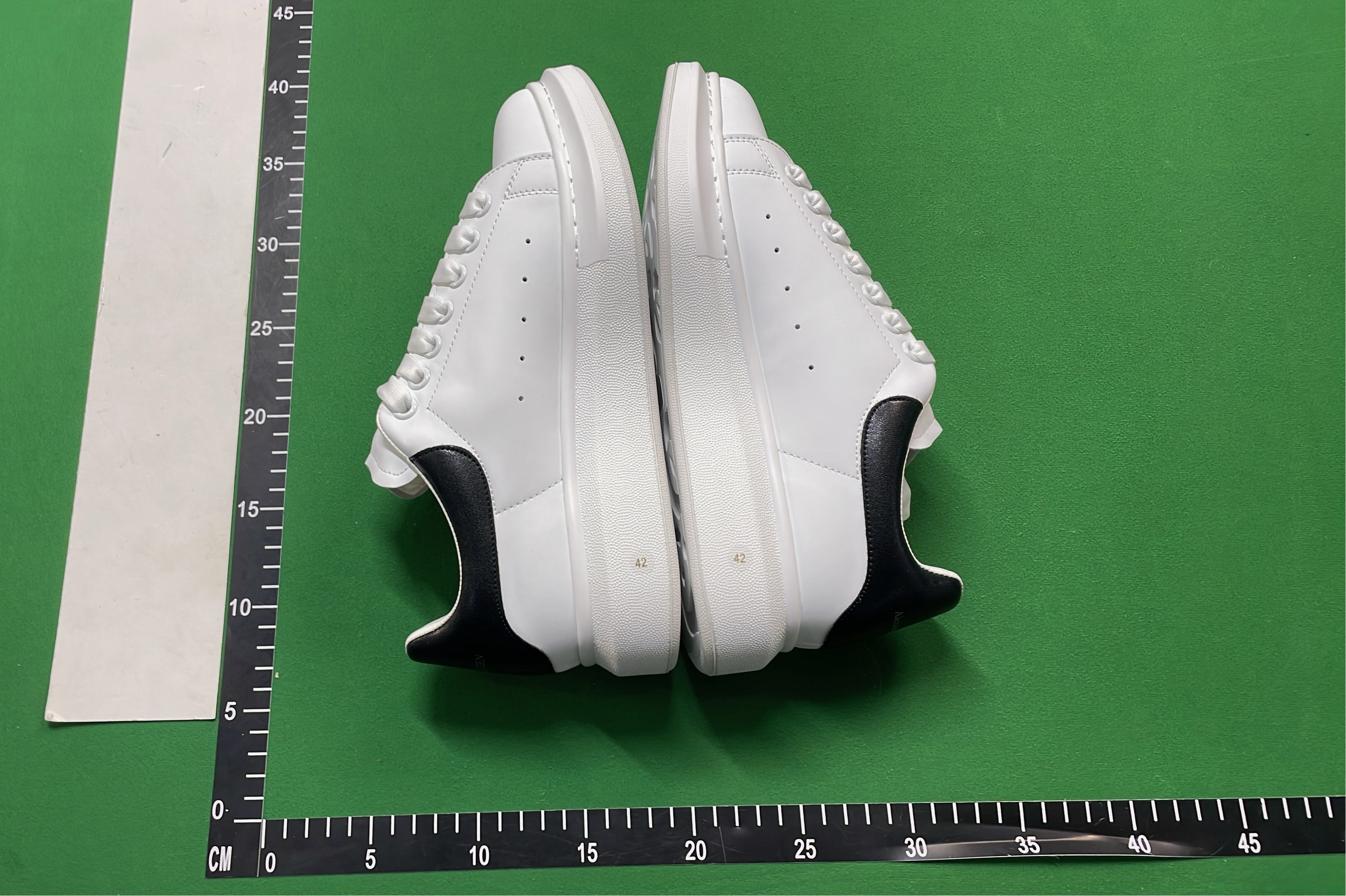 Alexander McQueen White Leather Sneakers with Colorful Heel Tab