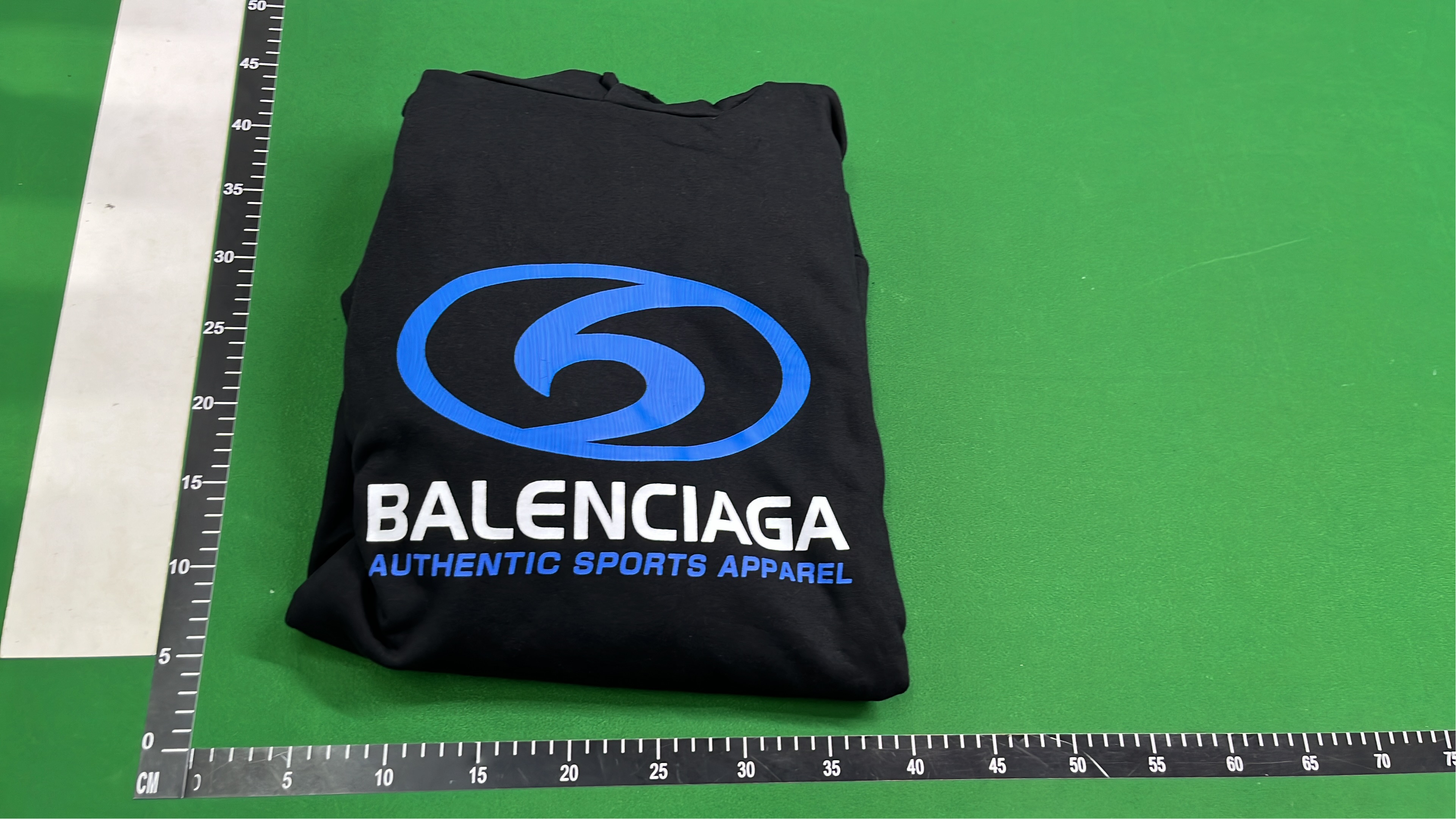 Black Hoodie with Blue Logo Design