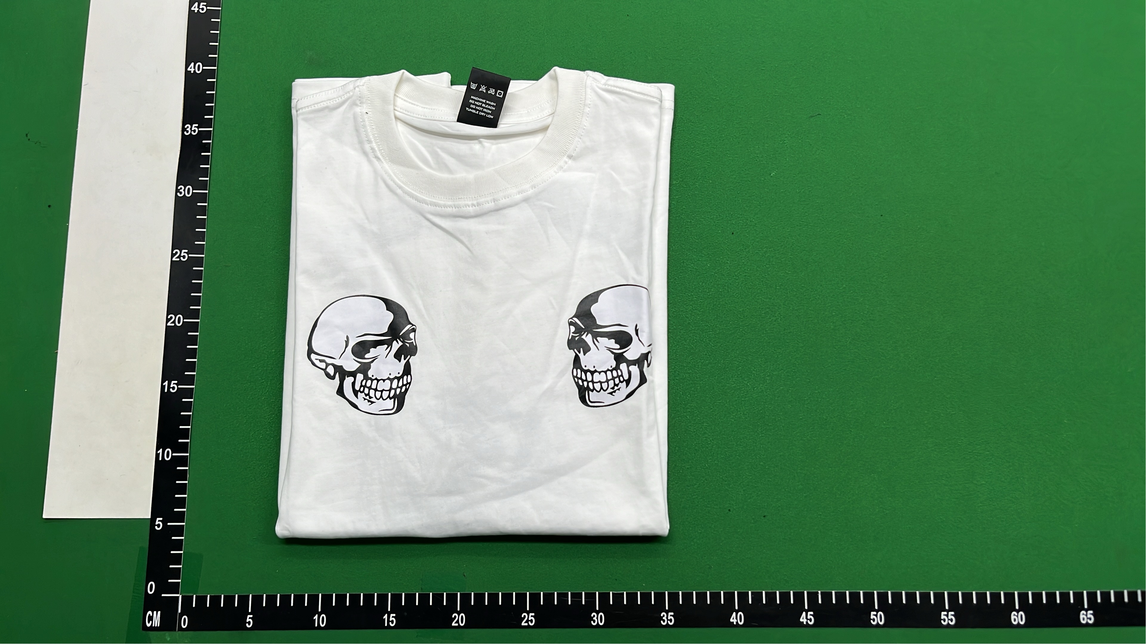 White T-Shirt with Dual Skull Design