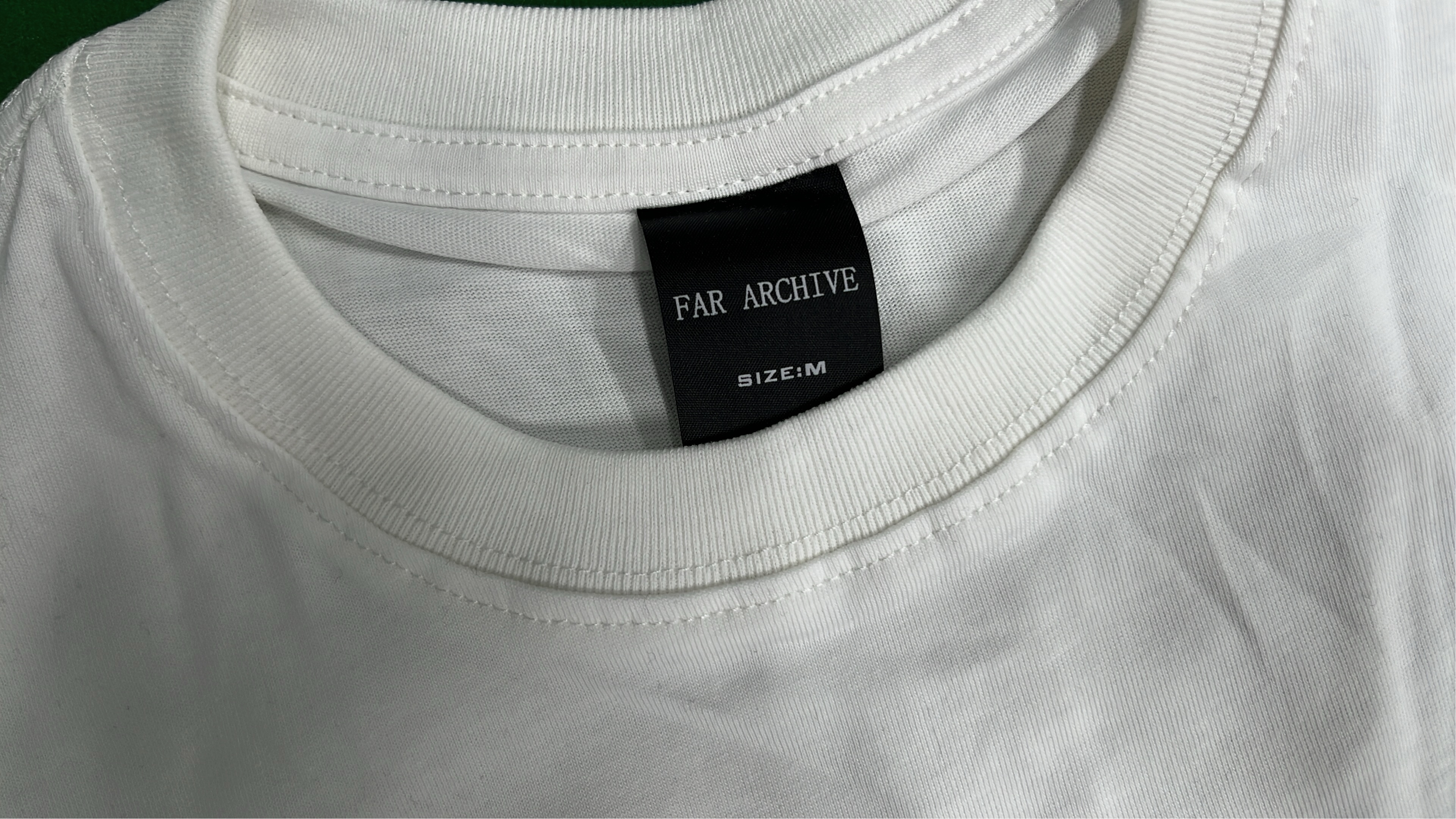 White T-Shirt with Dual Skull Design