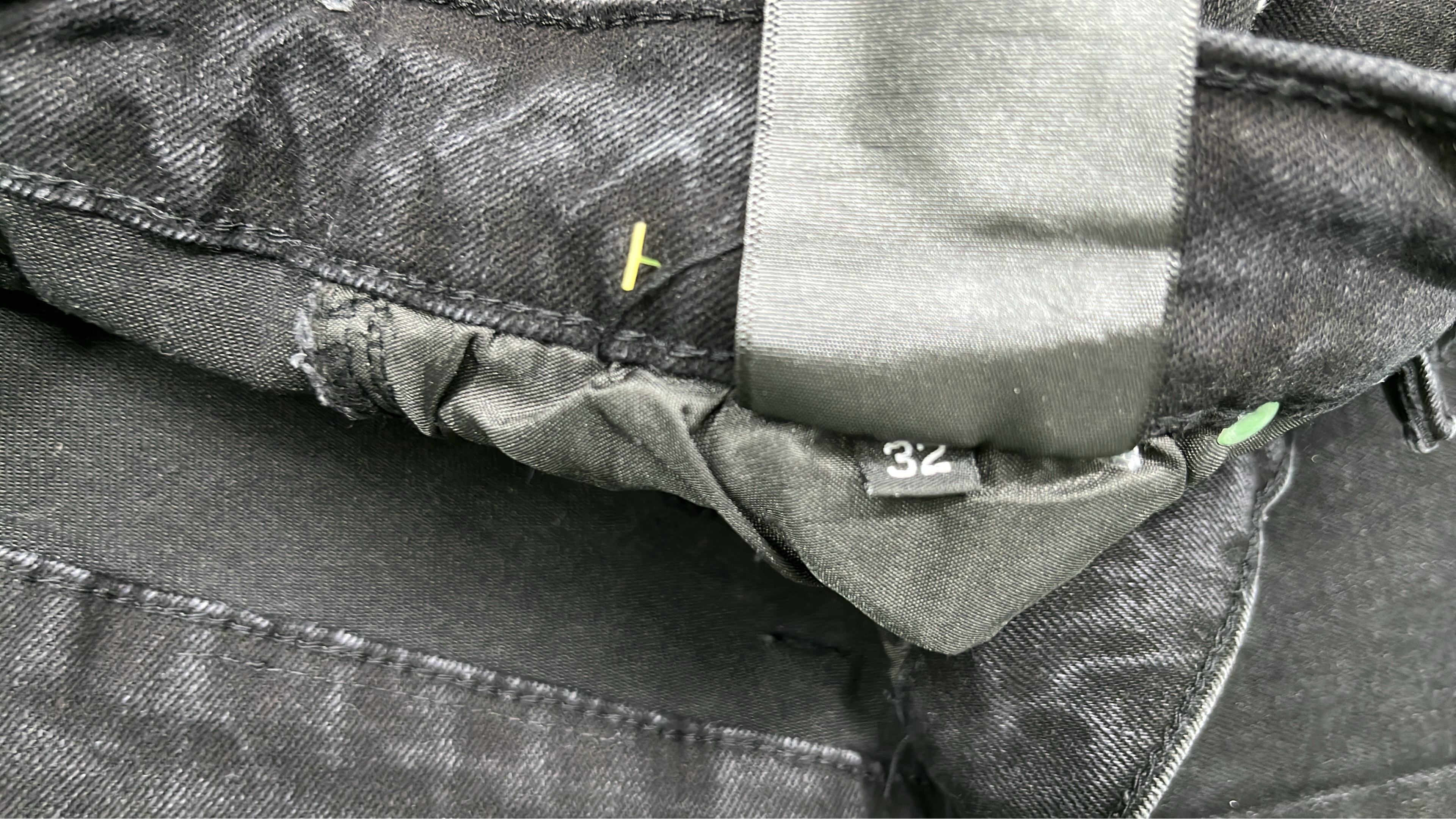 AMIRI Black Distressed Denim Jeans with Angel Print