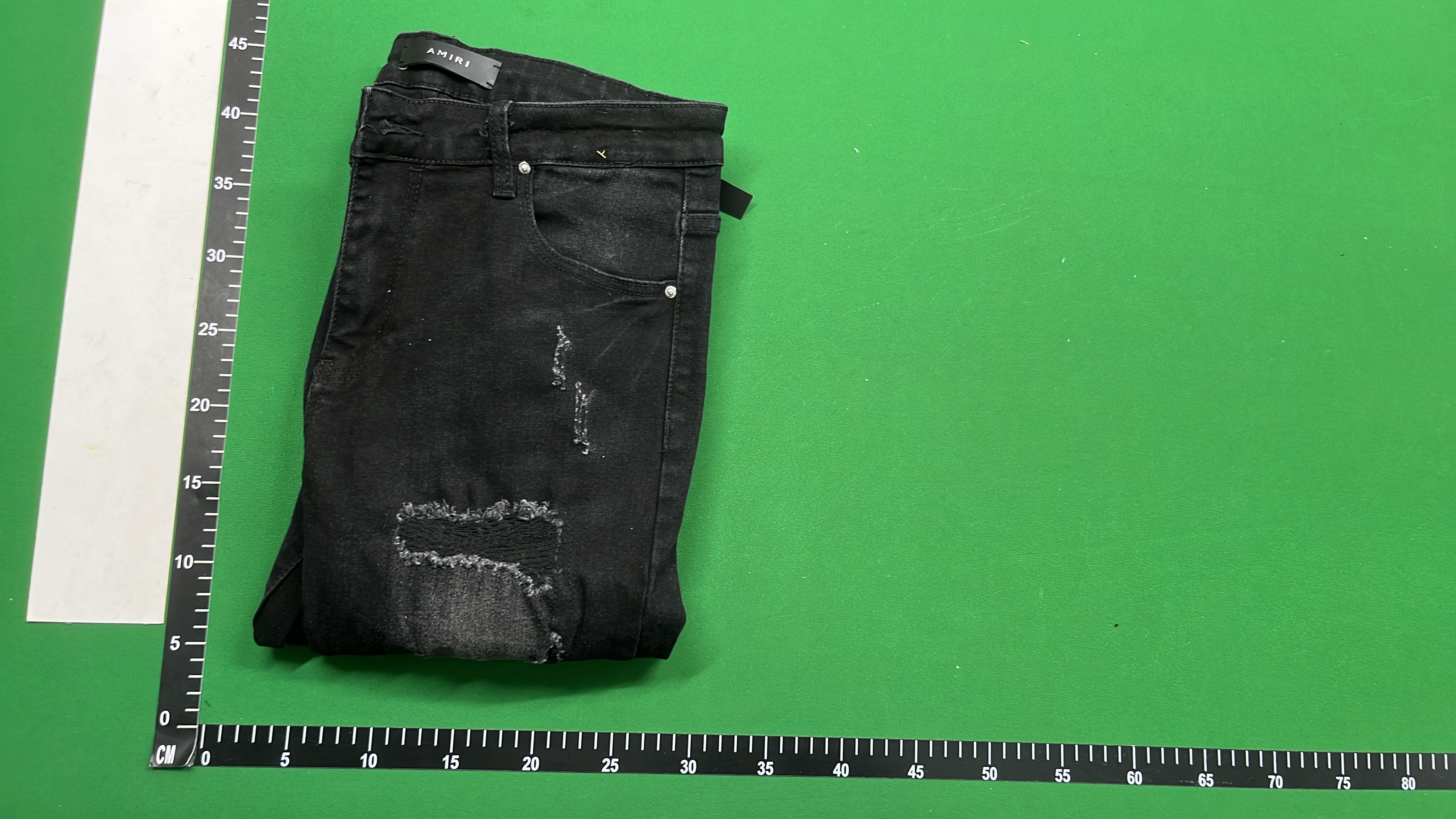 AMIRI Black Distressed Denim Jeans with Angel Print