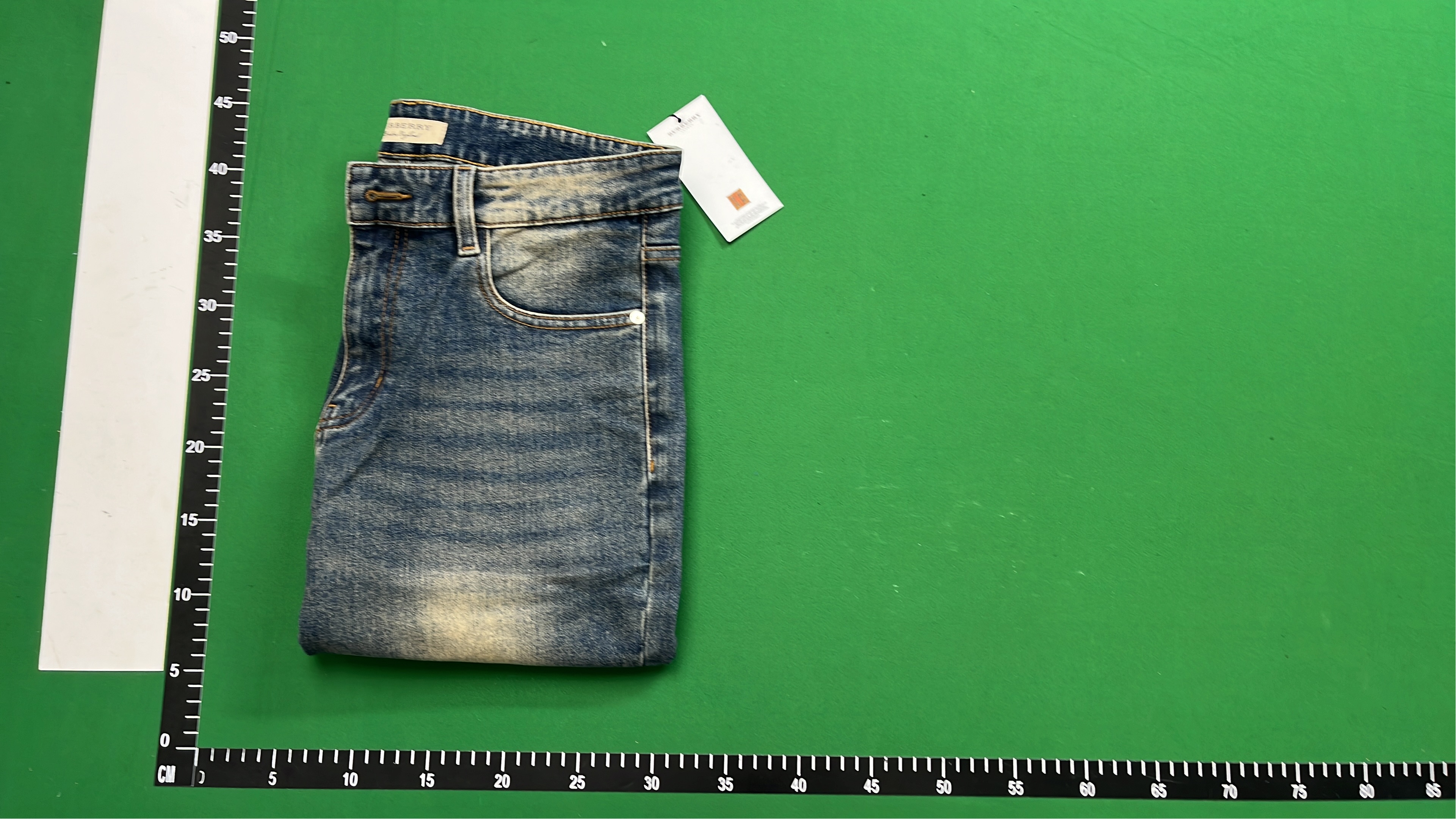 Burberry Men's Denim Jeans with Iconic Check Pocket Design