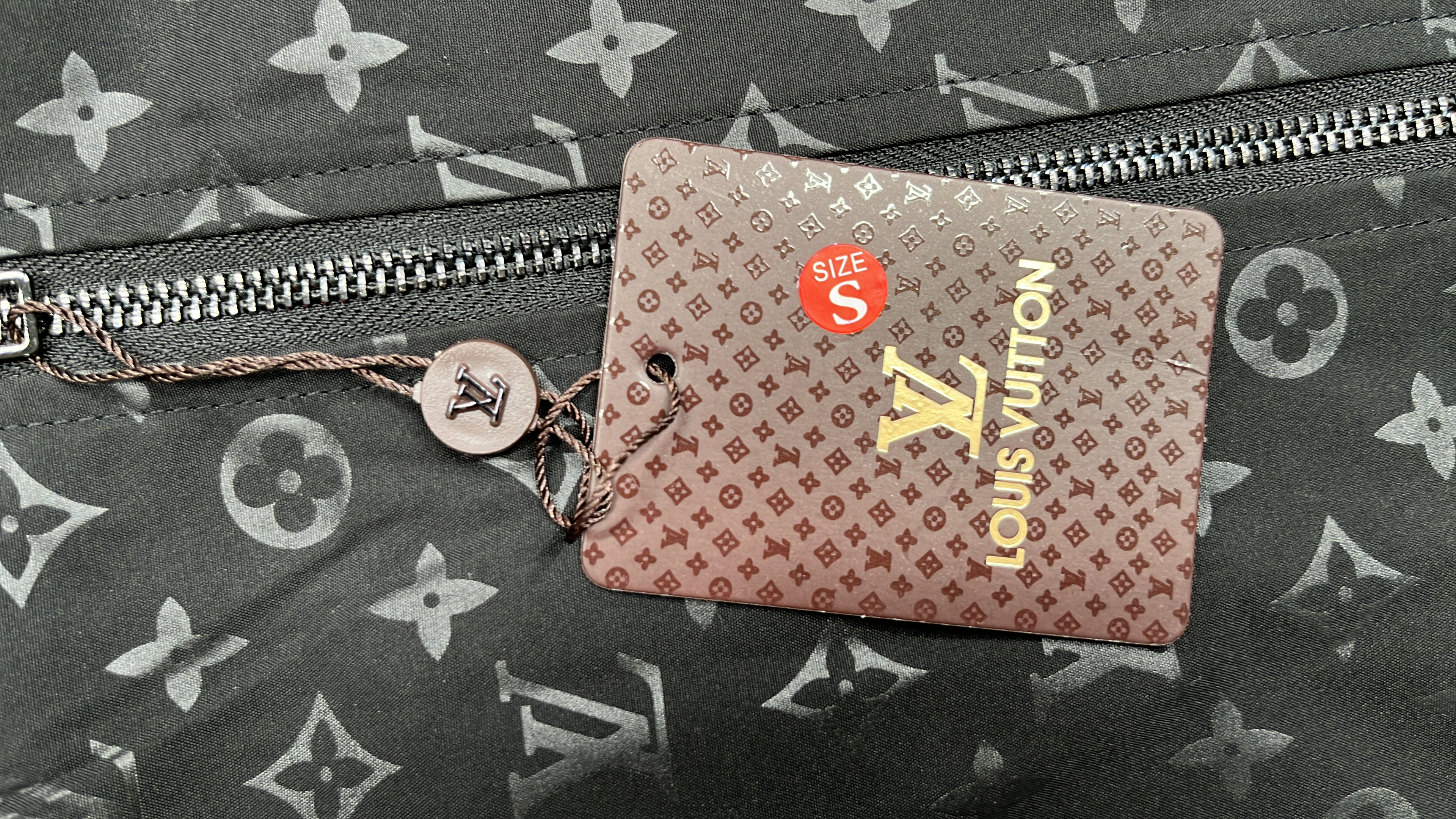 Louis Vuitton Monogram Leather Jacket with Logo Design