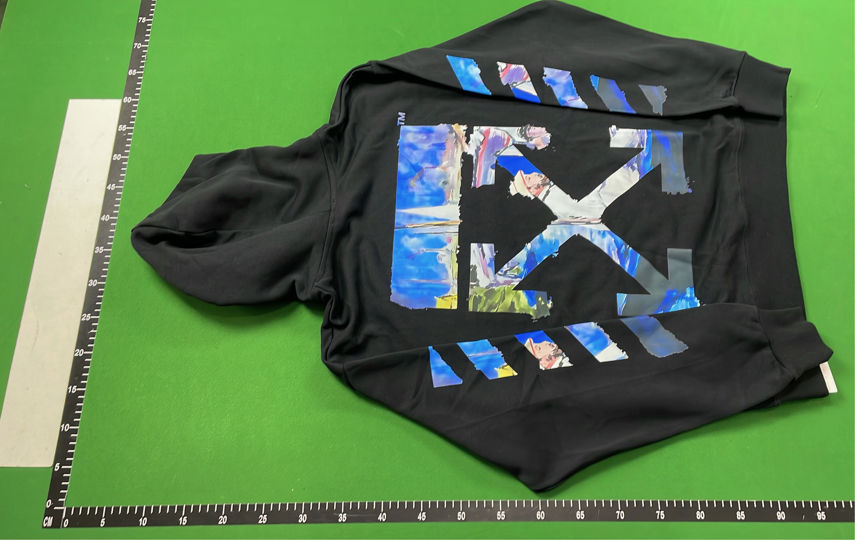 White and Black Patchwork Hoodie with Blue Accents