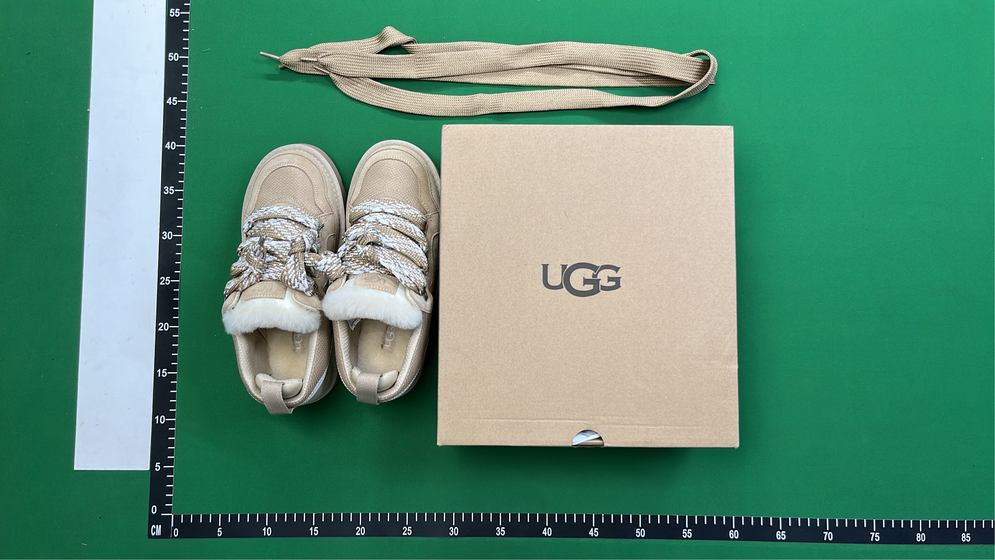 UGG Black Sneakers with Faux Fur Laces and Chunky Sole