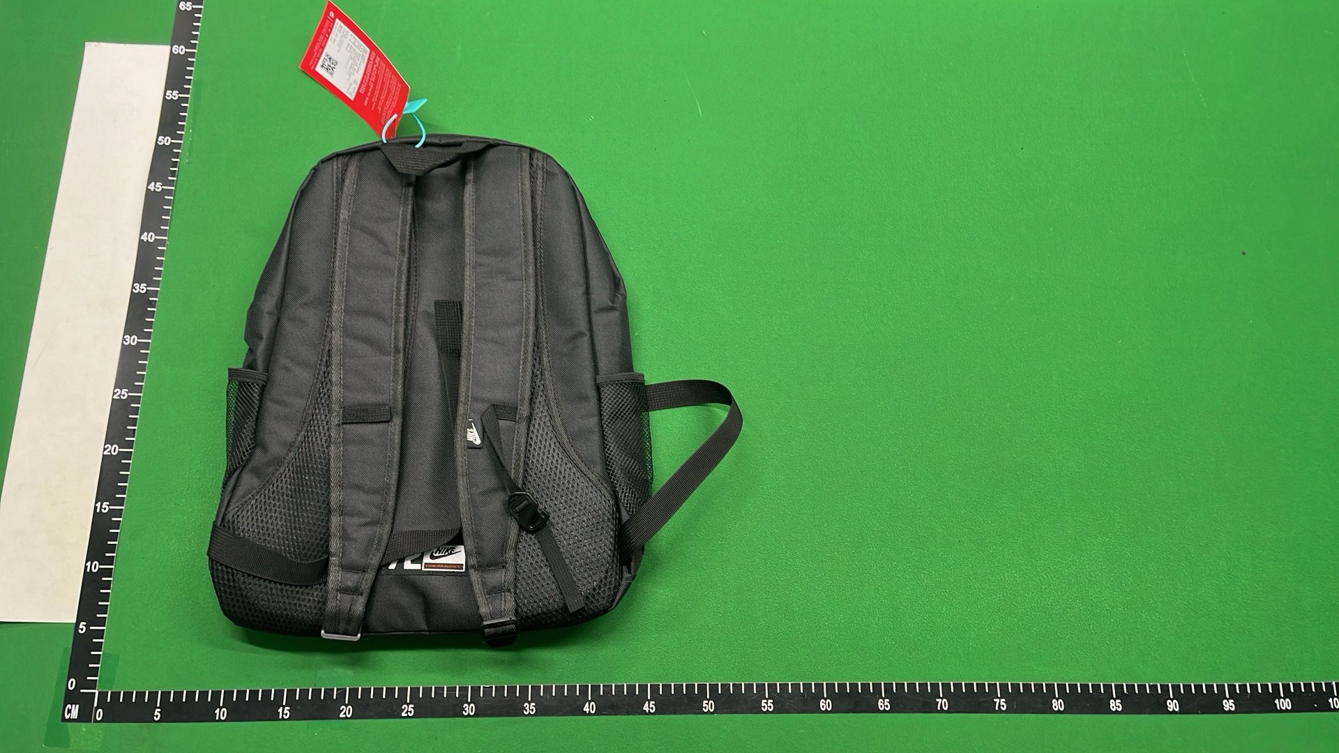 Nike Backpack with Large Swoosh Logo and Cord Design
