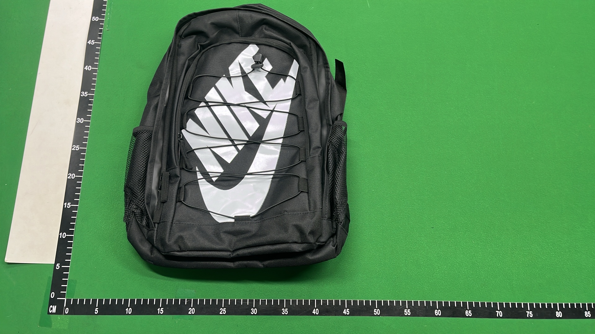 Nike Backpack with Large Swoosh Logo and Cord Design
