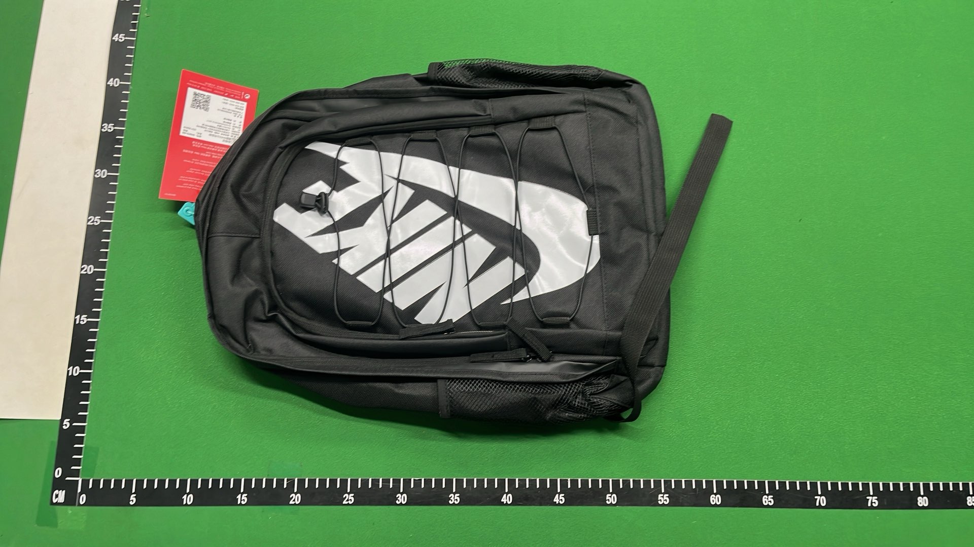 Nike Backpack with Large Swoosh Logo and Cord Design