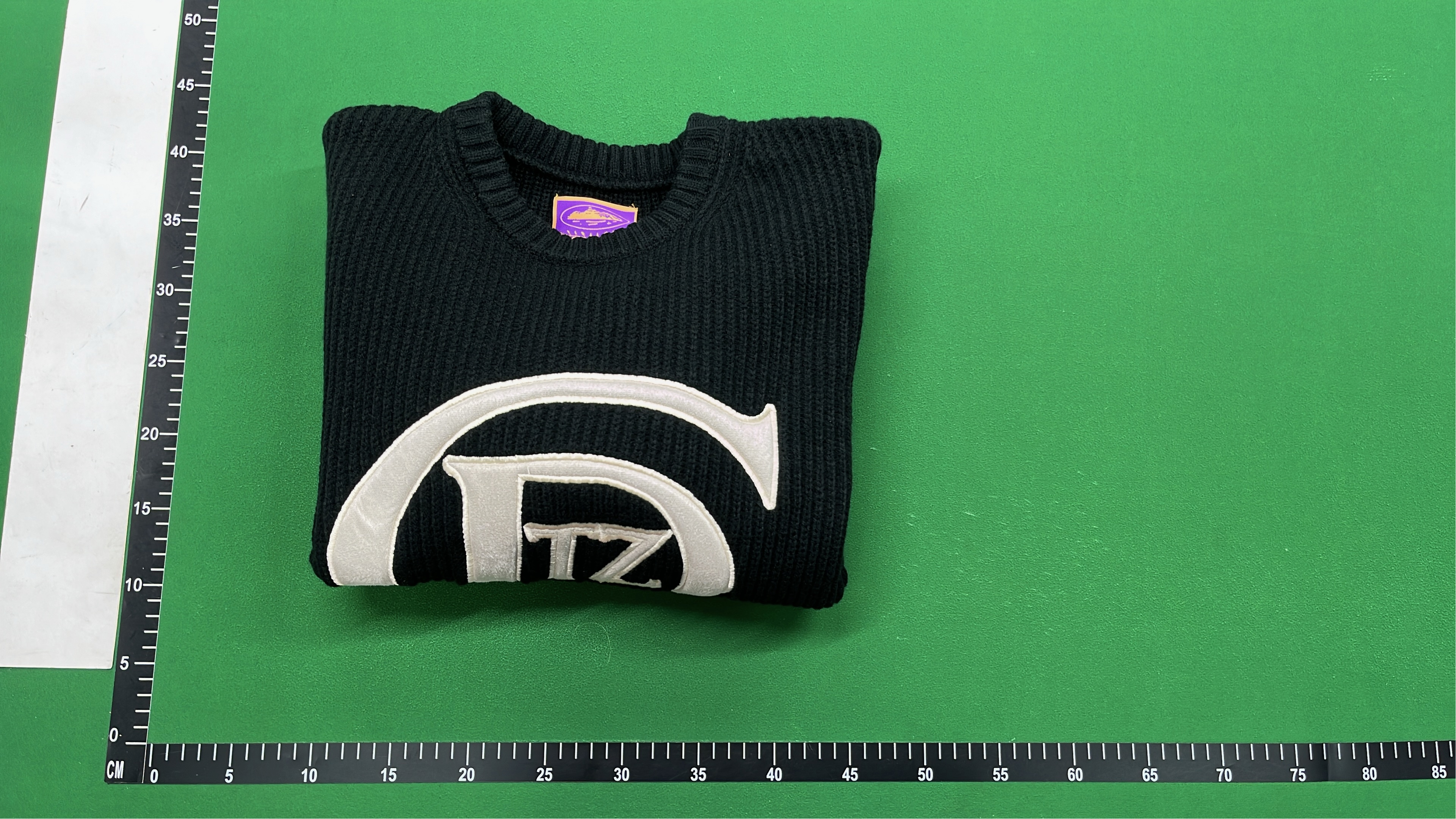 Lacoste Black Ribbed Sweater with Graphic Logo Design