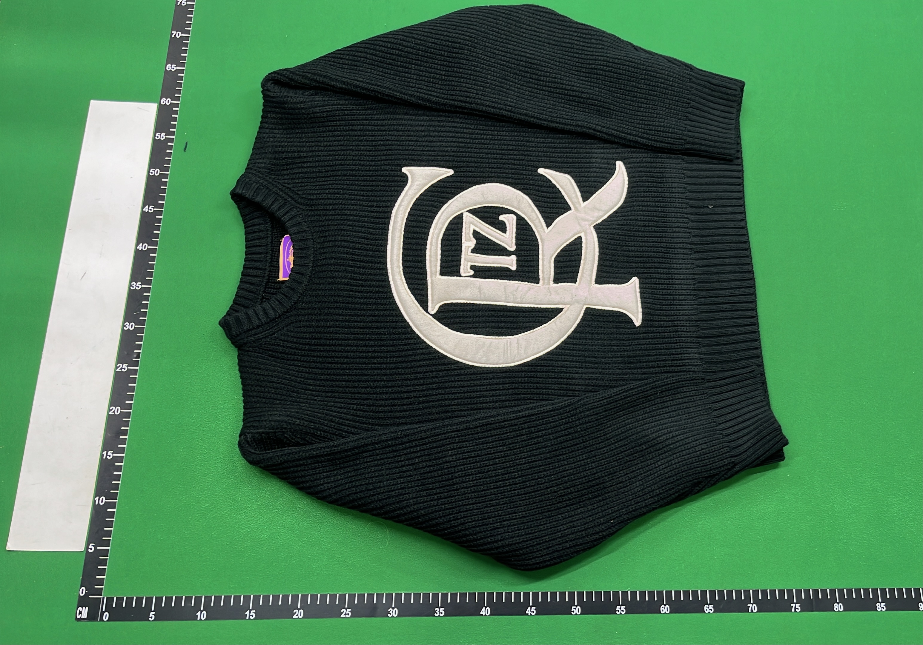 Lacoste Black Ribbed Sweater with Graphic Logo Design