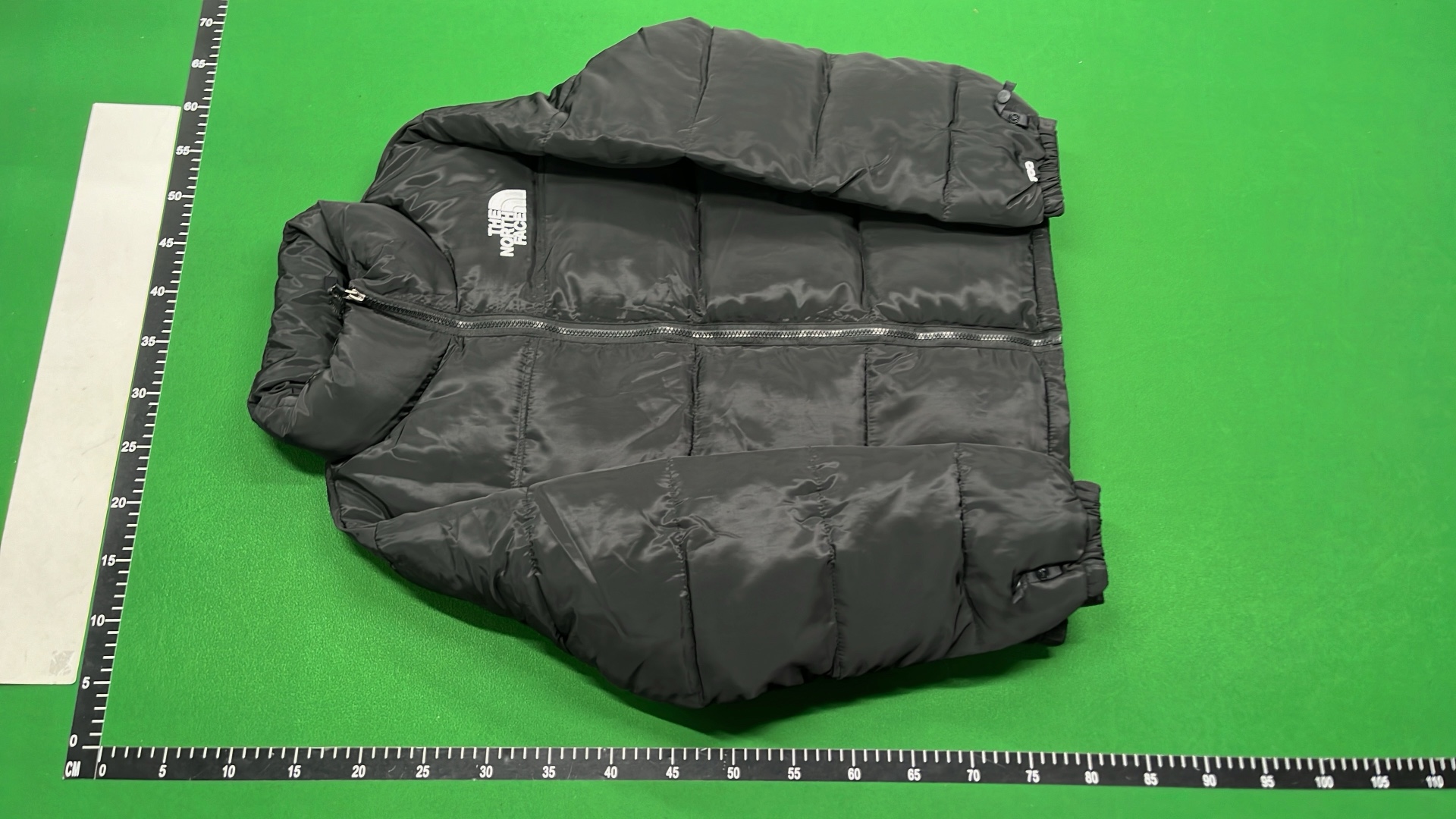 The North Face White Puffer Jacket with Black Collar