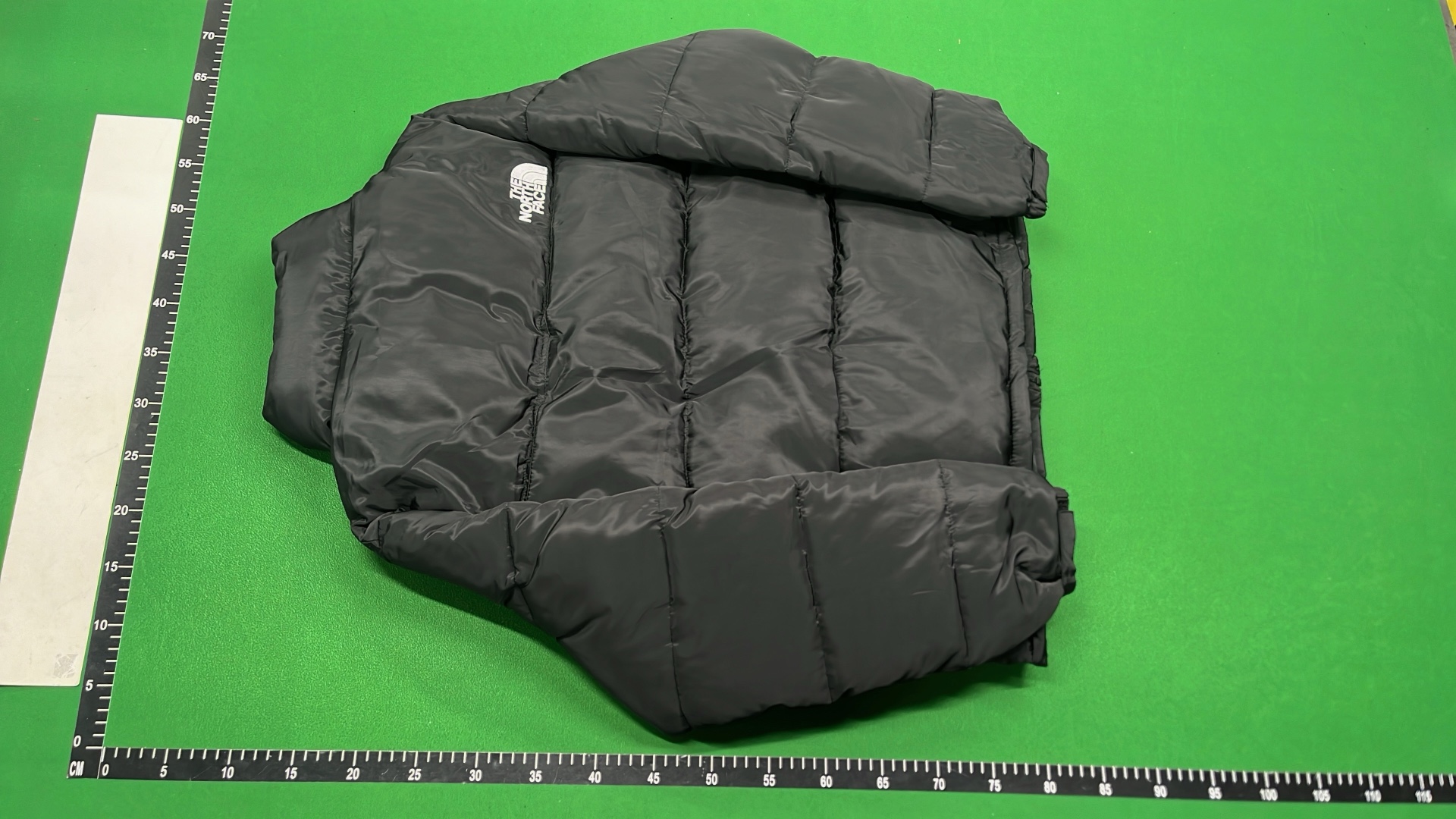 The North Face White Puffer Jacket with Black Collar