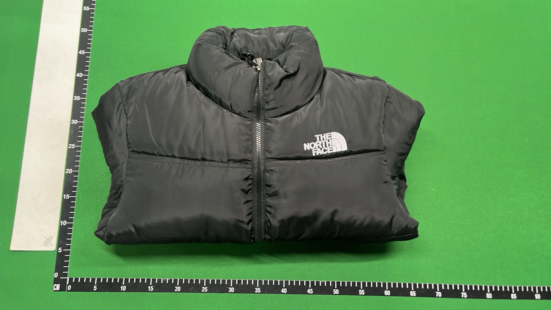 The North Face White Puffer Jacket with Black Collar