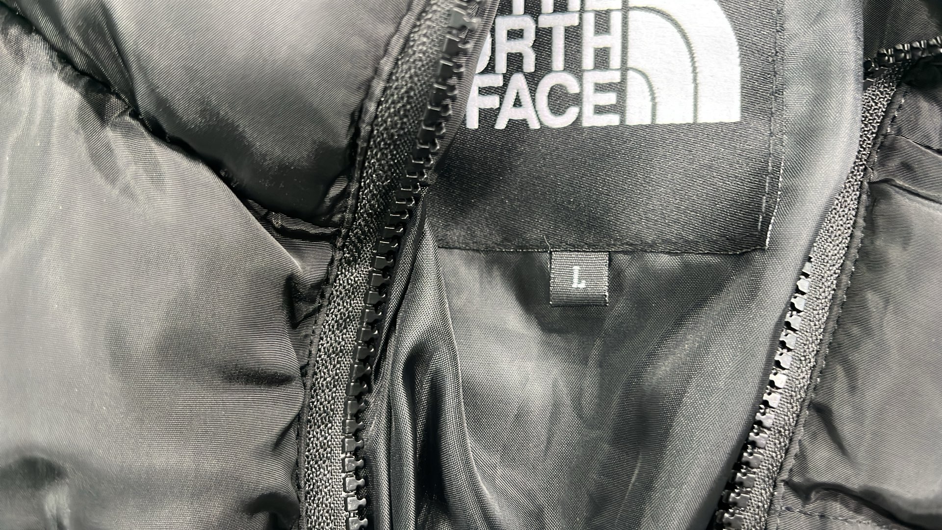 The North Face White Puffer Jacket with Black Collar