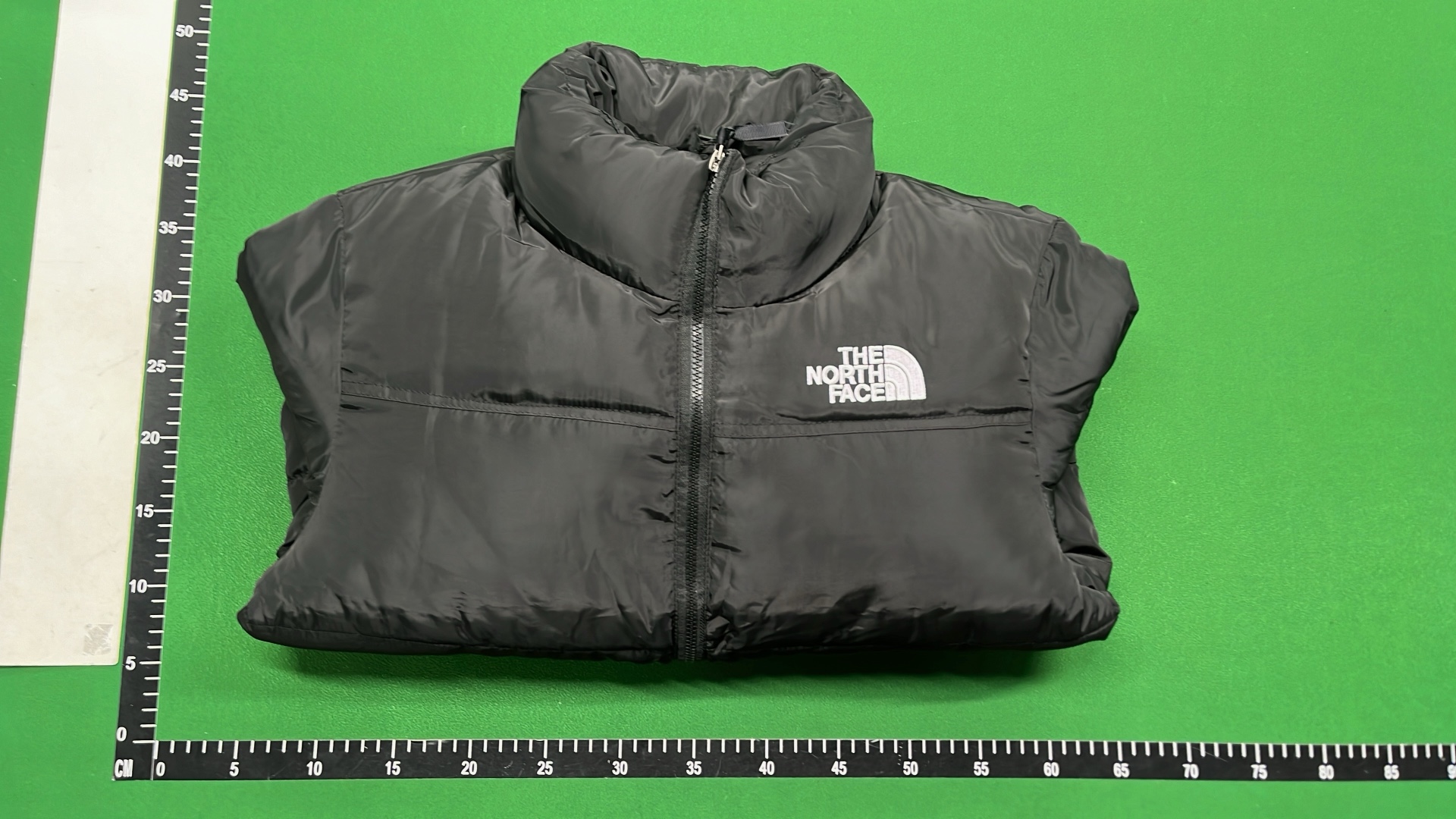 The North Face White Puffer Jacket with Black Collar