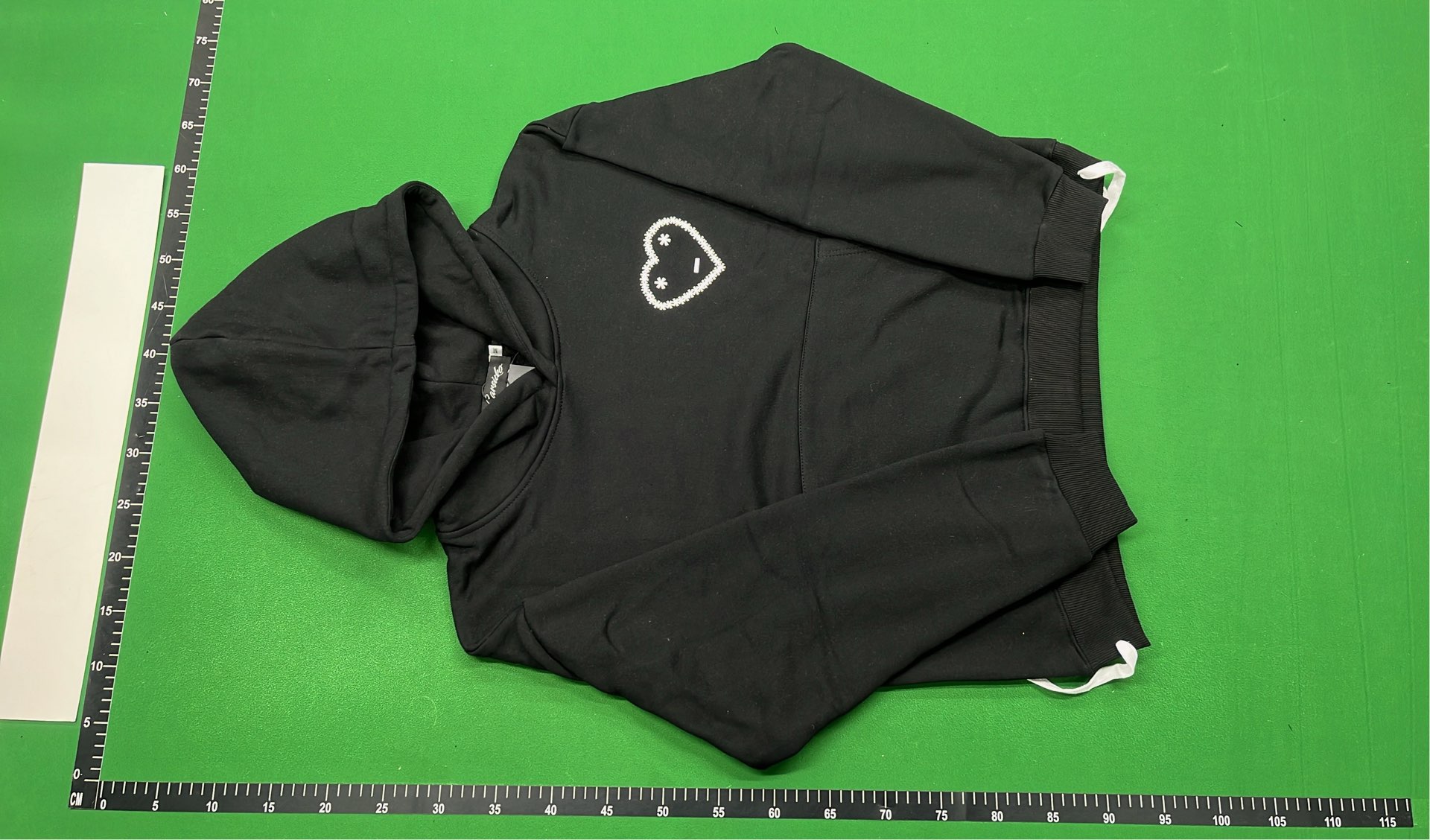 Black Hoodie with Minimalist Design and White Drawstrings
