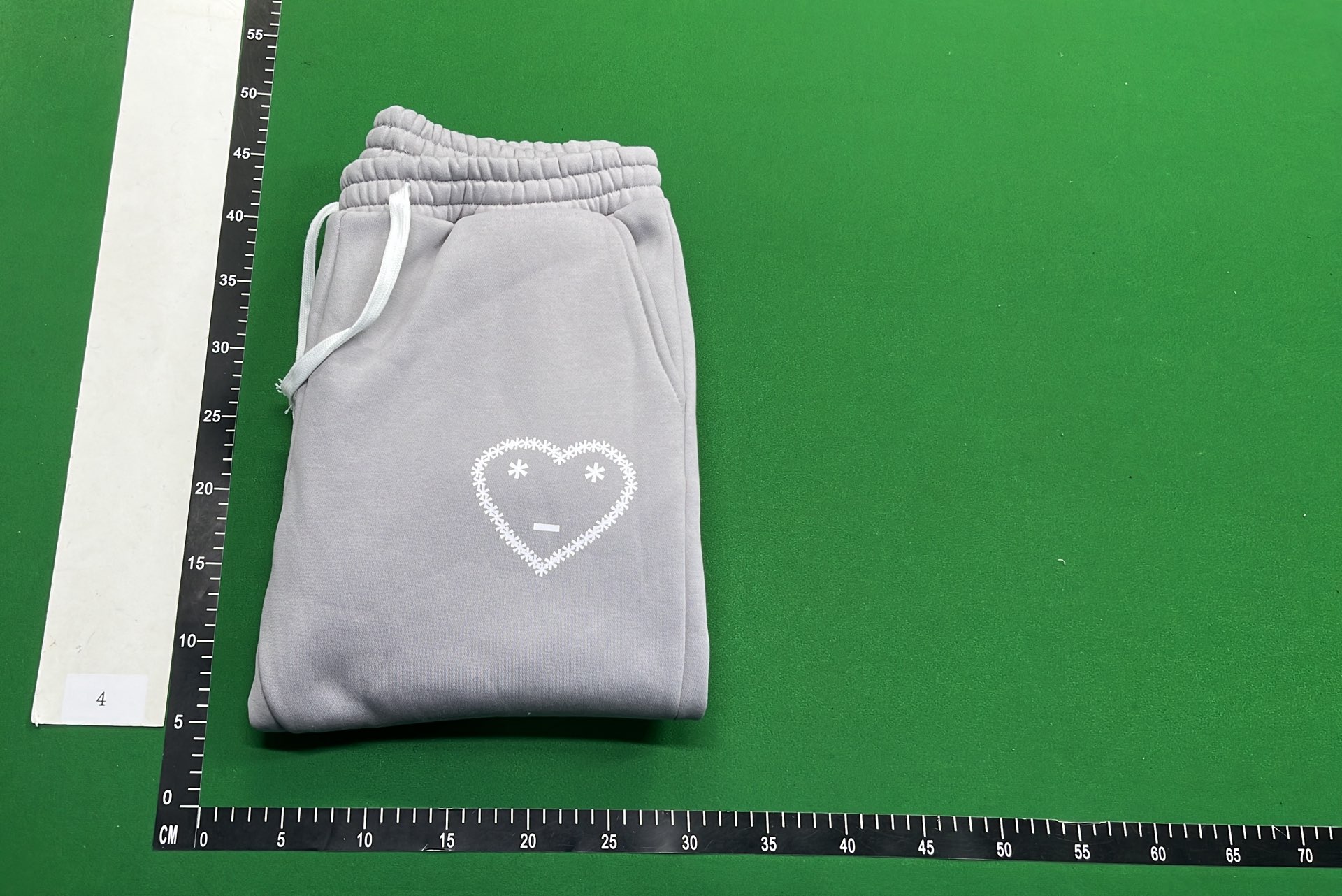 Black Hoodie with Minimalist Design and White Drawstrings