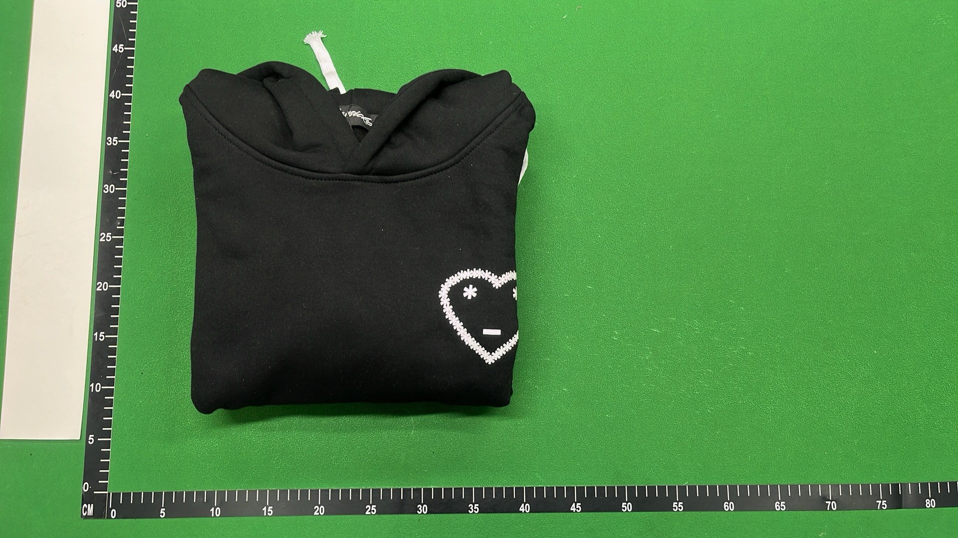 Black Hoodie with Minimalist Design and White Drawstrings