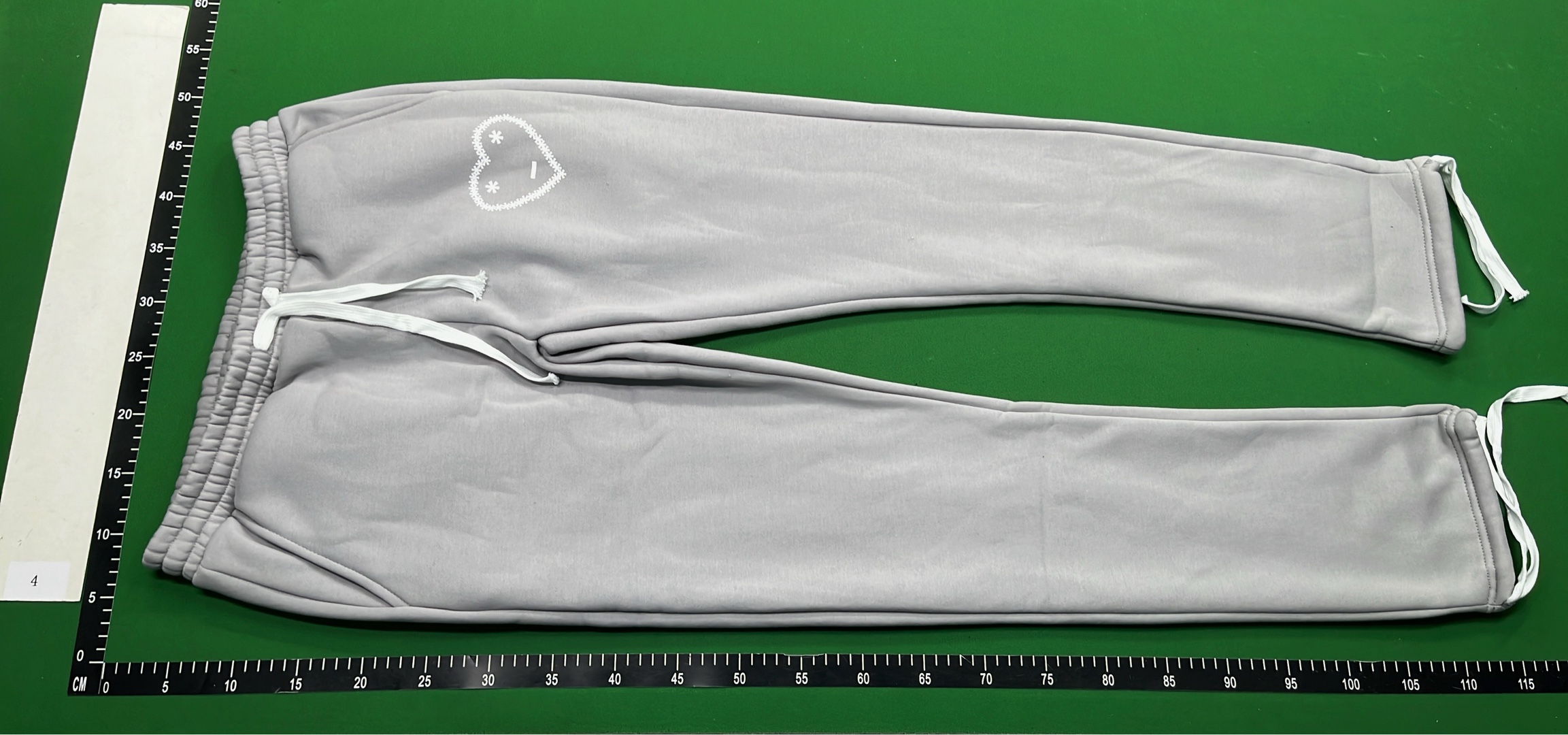 Black Hoodie with Minimalist Design and White Drawstrings