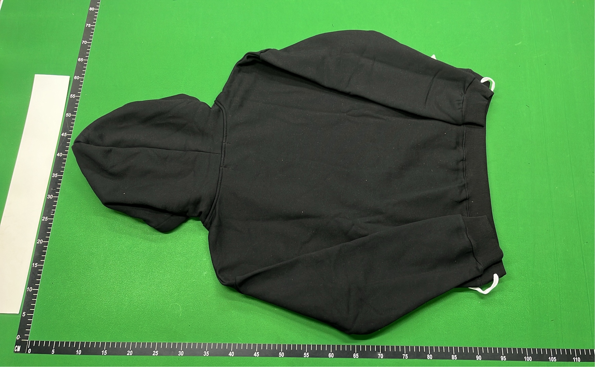 Black Hoodie with Minimalist Design and White Drawstrings