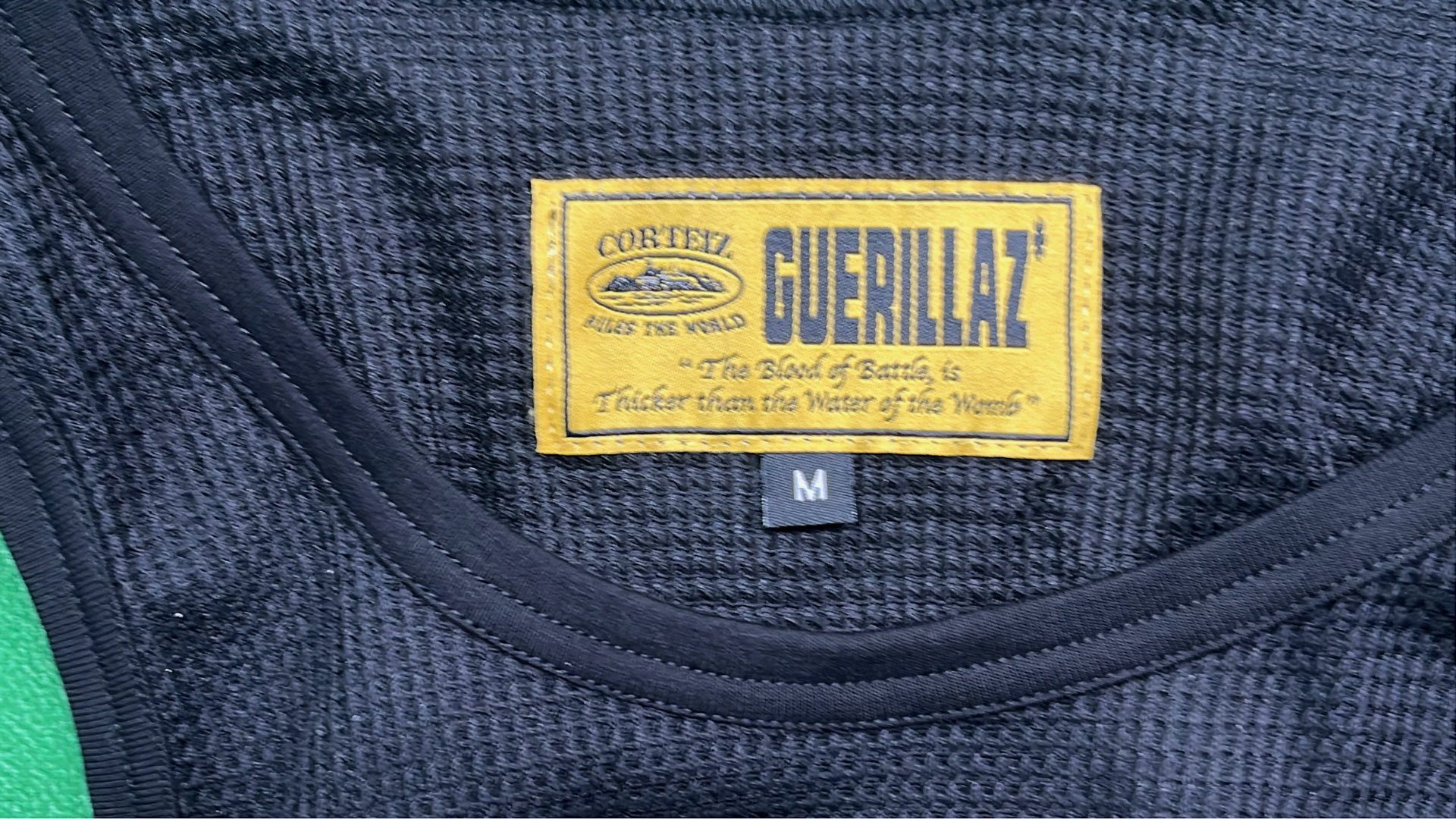 Black Ribbed Tank Top with Yellow Logo