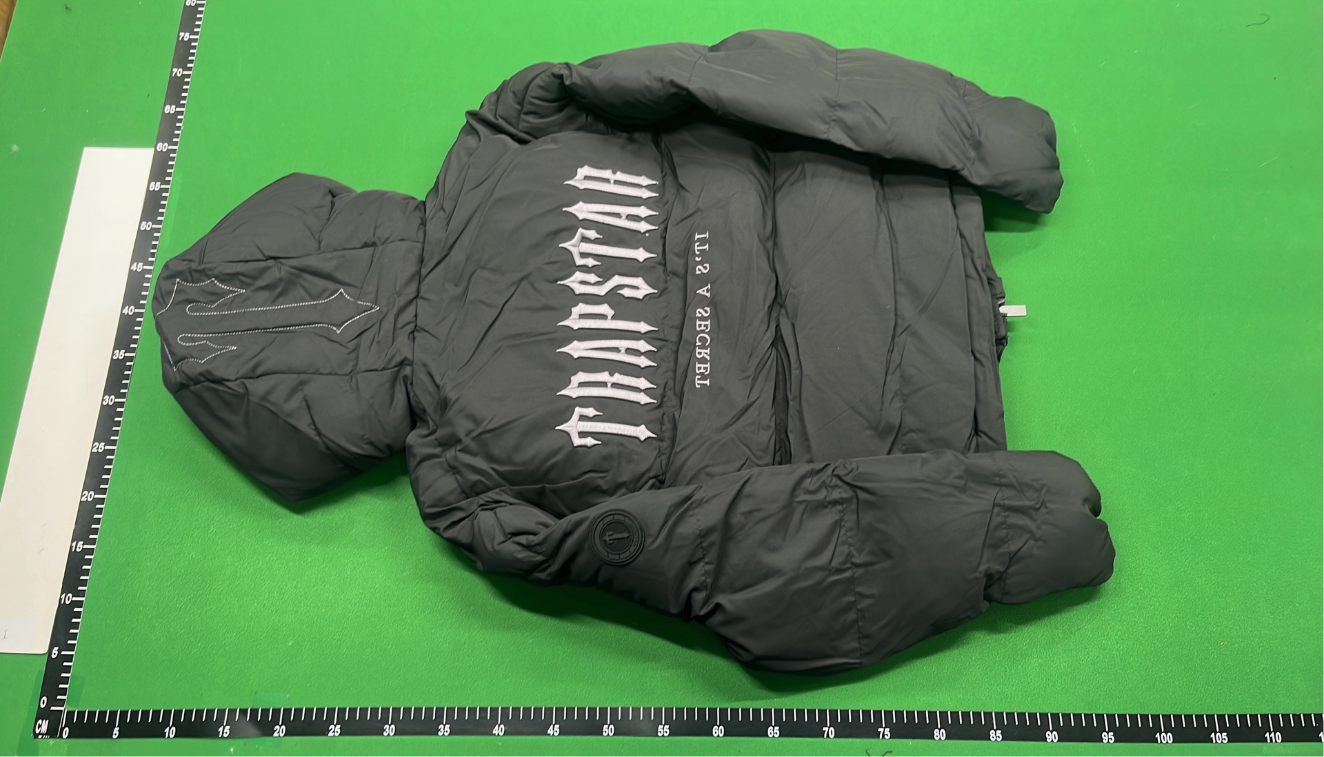 Black Puffer Jacket with Hood and Abstract Print
