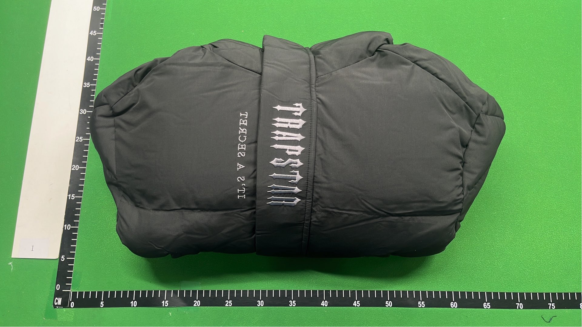 Black Puffer Jacket with Hood and Abstract Print