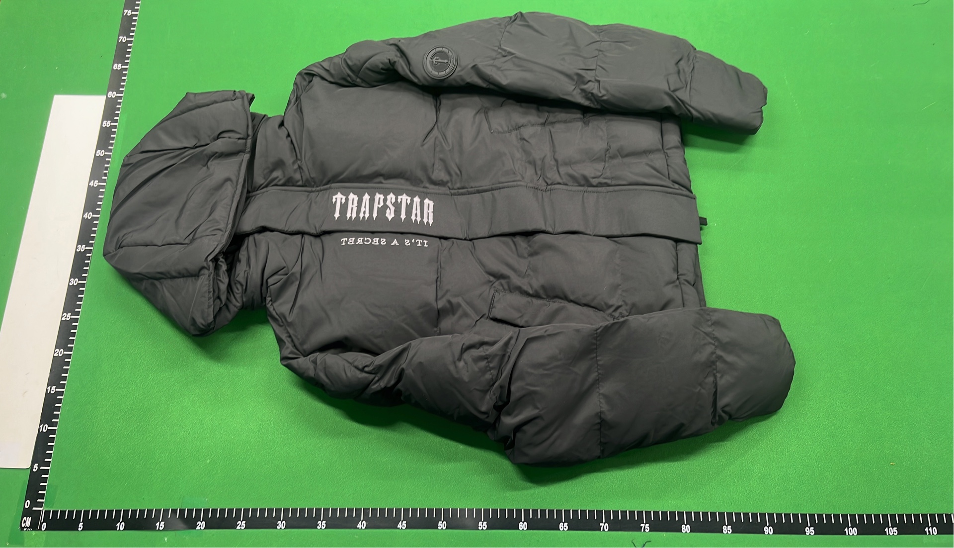 Black Puffer Jacket with Hood and Abstract Print
