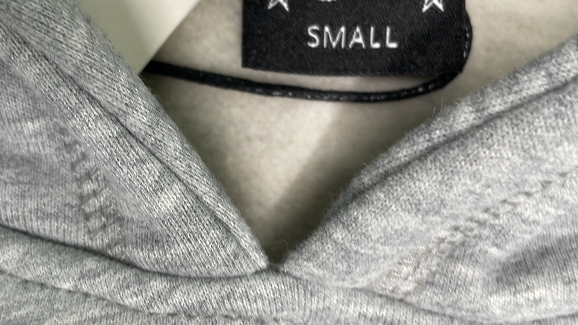 Black Hoodie with Minimal Logo Design